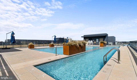 Photo of 8300 Wisconsin Avenue #1B-1-819, BETHESDA, MD 20814 (MLS # MDMC2188264)