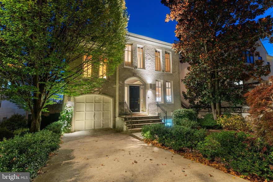 An Exceptionally refined residence nestled in the prestigious enclave of Berkley, one of Northwest's most coveted neighborhoods. This special property offers 5 levels above ground with open views to the Potomac Reservoir, offering a rare natural vista for Washington living.  Sunlight cascades through expansive windows, drawing your eye toward the beauty beyond.  Every inch of this home is graced with thoughtful details, custom finishes, architectural elements that have timeless elegance, very high ceilings, curated lighting, solid doors and elevated materials, creating a level of sophistication that discerning buyers will immediately recognize.  

The main level features an elegant foyer, with an arched entry to the hallway, a designer's kitchen with hand painted back splash tiles by Giovanni De Simone, brand new mid-grey quartz counter tops and breakfast table , crowned by the artistry of Waterworks in polished nickel, bookmatched cabinet doors, Thermador, Subzero appliances and commercial grade fan. The dining room has elegant decorative niches with indirect lighting opening to a delightful living room with 11 ft ceilings , floor to ceiling glass doors, fireplace, connecting to a cozy den with built in bookcase and glass doors opening to a spacious (20'x30') IPE deck with breathtaking reservoir views, stainless steel railings, and motorized awnings with sun and wind sensors. . The main level has an elegant powder room with marble floors and vanity top. It also has easy access to the one car garage. 

The First upper level has a total of 4 bedrooms and 3 full bathrooms. The primary bedroom has 14 ft vaulted ceiling with a fireplace,  picture windows and a loft / study with gorgeous views, a dressing area,  walk in closet and a luxurious all marble bathroom with two vanities, separate shower, whirl pool tub and a toilet room with bidet. The second bedroom has an ensuite all marble bathroom, the third and fourth bedrooms share a third bathroom. 

The second upper level has a study with lovely views and a storage room with a big wall closet. 
The first lower level is fully above ground and features a separate apartment that can be accessed from the side of the house. it has a very spacious living room with French doors with a potential kitchenette, a bedroom with a big window, a walk in coset and a roughed in full bath with tub.  
The second lower level features one of a kind Recreation room flooded with day light and sun; it  has 11 ft high ceilings, recessed lights, a Fireplace, a bar, huge glass doors with transom windows above,  leading to the backyard . this level has a powder room, spacious  laundry room and mechanical room. 
Additional  features and systems include: electric gutters to eliminate ice dams, automatic sprinkler system, whole house ventilation fan, automatic lighting in closets, low voltage lighting throughout, an electric roll-screen protecting a ten foot sliding glass door, additional under-counter refrigerator and ice machine, rough in for basement apartment. 

With a seller who has considered every nuance, this home offers not just beauty, but intention: effortless living, curated comfort, and an ambiance that exceeds expectations. A truly distinguished offering!