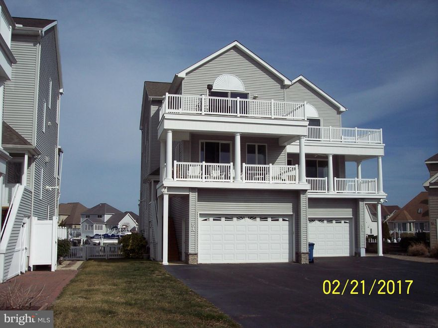 3000 sq ft townhouse on the water. Boat dock and boat lift. 2 car garage, elevator, fireplace, fenced back yard. Community Yacht club, tennis, 5 swimming pools, golf course, fire and police departments. Minutes to Ocean City beaches.