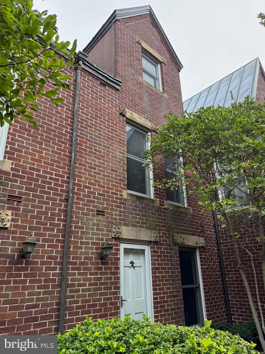 Welcome to this all-brick, three-level townhome nestled in the highly sought-after Torpedo Factory Condominiums—a serene, gated enclave just steps from the Potomac River and the vibrant shops, dining, and galleries of historic Old Town.  This 2-bedroom, 2.5-bath residence offers over 1,800 square feet of thoughtfully designed living space. The versatile third level is ideal as a guest suite, home office, or recreation room—tailor it to fit your lifestyle.  Step through sliding glass doors to your own private, beautifully landscaped patio with lush common green space just beyond—perfect for outdoor entertaining or peaceful morning coffee.  Additional highlights include: Secured access from Union Street with an elevator, Dedicated garage parking plus additional secure storage, Elegant and open living/dining area with large windows and abundant natural light, Steps to Trader Joe’s, Harris Teeter, and dozens of restaurants, coffee shops, and boutiques, One block to the Potomac River waterfront, boardwalk, and bike trails, Across the street from the iconic Torpedo Factory Art Center. Commuters will love the easy access to shuttles to Metro, Reagan National Airport, and options for weekend adventures including the Mount Vernon Trail, water taxis to The Wharf, Georgetown, and Nats Park, and quick rides to Audi Field for soccer fans.  Live where art, history, and modern convenience meet—this is Old Town living at its finest!