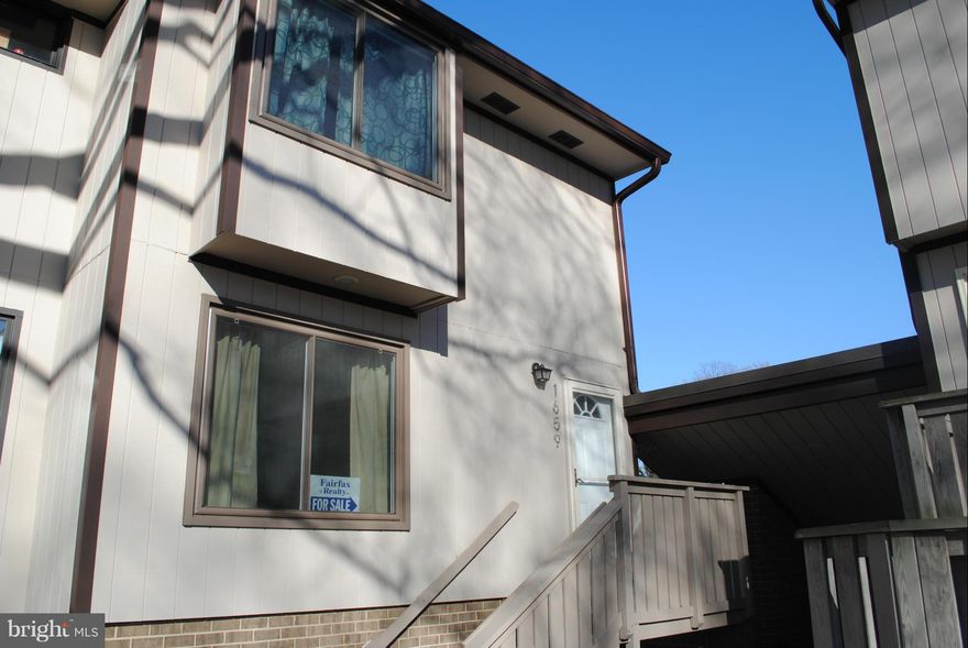 Spacious & Airy 2 story 2 bedroom 1.5 BA end unit townhome/condo. Kitchen w/HW floors & 42" cabinets w/built-in pantry. Includes stainless appliances & tile backsplash, Laundry located on upper level, w/full size W&D. New windows for energy efficiency. Tot lots, basketball courts, community pool and more. Only blocks to Silver Line metro and minutes to shopping, restaurants & more.