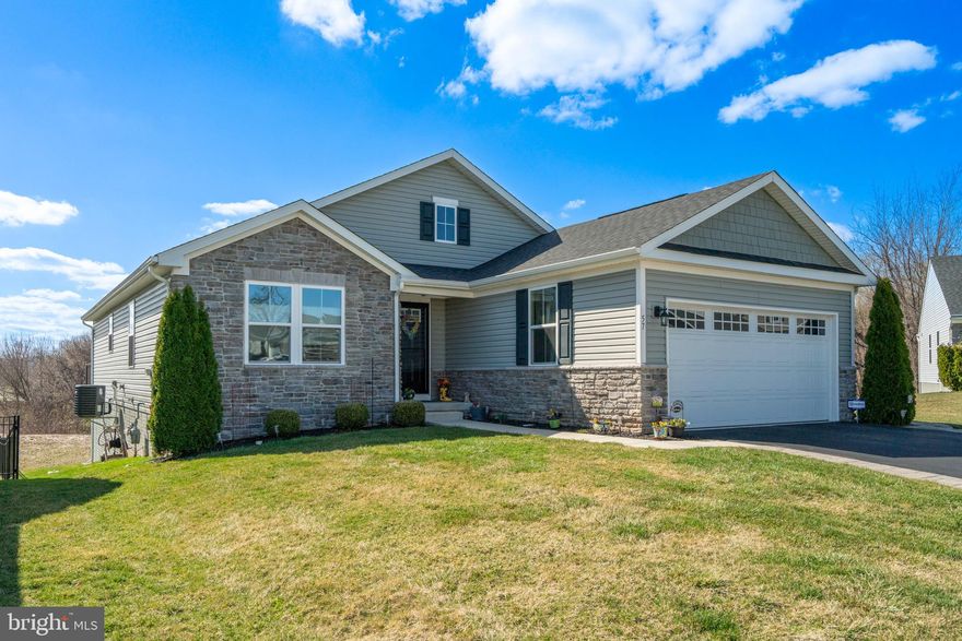 Welcome to the home you’ve been waiting for. Built in 2020, this 3-bedroom, 2 full bath home offers the layout, updates, and finished space that are hard to find all in one place. From the moment you walk in, the bright, cohesive color scheme and recessed lighting throughout create a clean, modern feel. The open concept layout connects the kitchen, dining, and living areas seamlessly, creating a space that works just as well for everyday living as it does for entertaining. The kitchen is the centerpiece with pale gray cabinetry, quartz countertops, tile backsplash, stainless steel appliances, and a large center island. Just off the kitchen, the breakfast room leads directly to the Trex deck added in 2021, creating an easy transition to the outdoor space. A separate formal dining room provides a dedicated space for hosting and adds flexibility to the main level. New LVP flooring runs throughout the main level, while the bedrooms offer the comfort of wall-to-wall carpeting. The primary suite is spacious and offers a private retreat with a double sink vanity, tiled flooring, tiled walk-in shower, and a very large walk-in closet. Two additional bedrooms and a second full bath featuring tiled flooring and a tiled tub/shower surround complete the main level. The finished basement, completed in 2024, adds 800 sq ft of living space and is currently set up as a family room, game area, and workout space, with a walkout slider leading directly to the patio added in 2023. An additional unfinished area provides excellent storage and flexibility. The backyard is designed for both relaxation and entertaining, offering upper and lower outdoor living spaces. Enjoy the elevated deck off the main level or step out from the basement to the patio, all overlooking open space with peaceful views. Additional highlights include driveway pavers added in 2021 and a 2-car garage. Located on a small street with minimal traffic, this home offers a quieter setting while still being part of a community designed for both convenience and lifestyle. Residents enjoy access to walking paths throughout the neighborhood, a sports field with soccer and lacrosse nets, a playground, a pool, and recreational facilities. Everyday convenience is just minutes away with shopping and dining at nearby Sadsbury Commons, including major retailers, restaurants, and services, along with additional development underway featuring even more options. Penn Medicine with urgent care is also close by, and local favorites like Harry’s Hot Dogs and Athena Ice Cream, Coffee, and Baked Goods are within walking distance. Schedule your private showing today and experience the space, setting, and lifestyle this home offers. Showings begin after Open House on 4/11 from 12-2pm