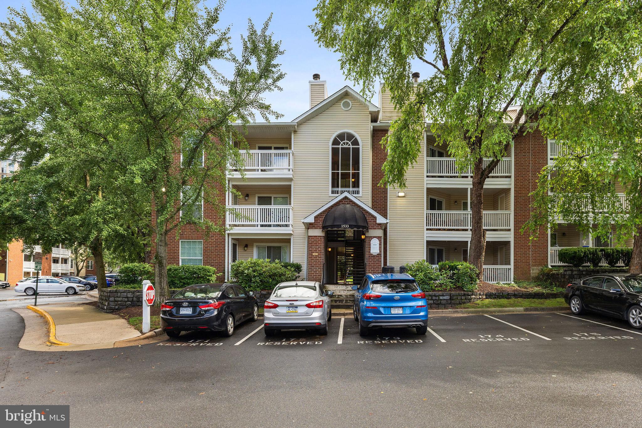 Welcome to your elevated urban retreat, a beautifully updated 1-bedroom, 1-bathroom condo nestled in one of the most dynamic and sought-after locations in the D.C. Metro area: the heart of Tysons, McLean. This top floor unit comes with vaulted ceilings, hardwood floors throughout, and a renovated kitchen with granite countertops, stainless steel appliances, and ample storage. The upgraded bathroom offers a granite vanity and Italian tile flooring. Enjoy a spacious private balcony, cozy wood-burning fireplace, and recent upgrades including newer windows, water heater, and Bosch washer/dryer. Located in The Fountains at McLean, a well-maintained community with resort-style amenities: fitness center, pool, hot tub, sauna, and clubhouse. This move-in ready unit is ideally situated near two Metro stations, Tysons Galleria, Harris Teeter, and a wide variety of shopping, dining, and grocery options. Convenient access to Route 7, I-495, and the Dulles Toll Road makes commuting a breeze. Don’t miss this rare opportunity in the heart of Tysons!