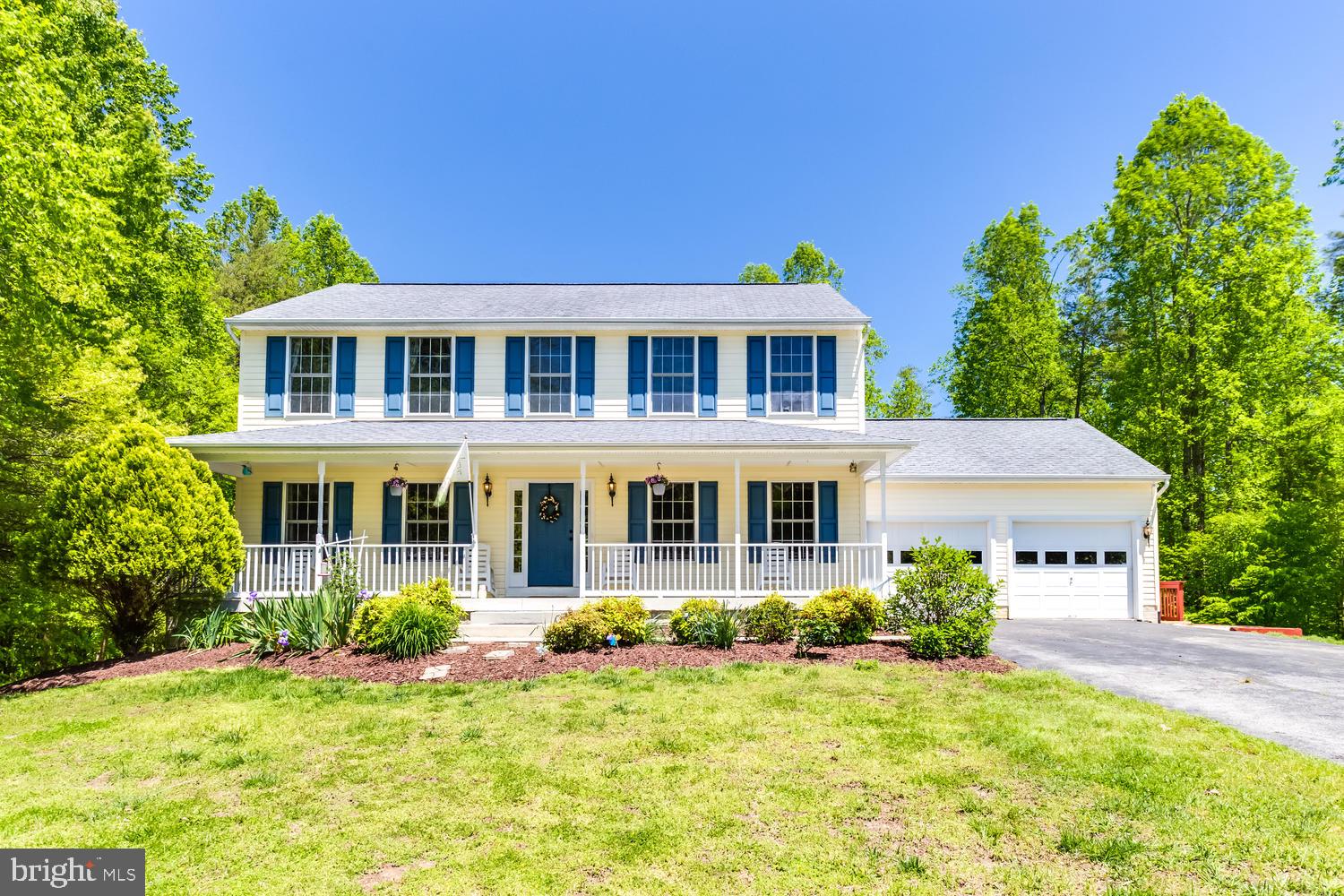 Don't miss this beautiful 5 bedroom, 3.5 bathroom Colonial located on a quiet cul de sac sited on 6.82 acres! Large eat-in kitchen with stainless steel appliances, expansive counter space, large window above the sink over-looking the backyard, double-door pantry, sliding door to deck and space for a large table for dining. Access to mud room with shelving, sink and door to garage are right off of kitchen. Great flow through the main level from kitchen to the family room, kitchen to the dining room. The family room offers a large picture window with view of the backyard, new pellet stove and built-in bookcase. The dining room delights with hardwood floors, chair rails and large windows looking out to the front yard. The master bedroom provides an ensuite bath with double vanity, linen closet, stall shower, soaking tub and walk-in closet. The other two upper level bedrooms offer walk-in closets, ceiling fans and views of the front and backyards. Convenient access to laundry on upper in laundry room with view of backyard, shelving and full size washer and dryer. The basement offers 2 additional bedrooms with one offering an ensuite bath. The basement is rounded out by two recreation areas, one with sliding door to walk-out to backyard and a large storage room/utility room. Enjoy the outdoors on your full size front porch, large rear deck or spacious yard with shed. The wooded acreage allows for adventure with cut trails and hunting stands. The established, quiet subdivision delights with large lots, well-maintained properties and wide roads for biking and walking. This one is a true gem!