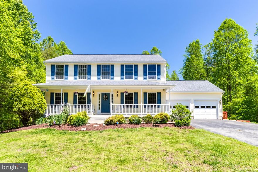 Don't miss this beautiful 5 bedroom, 3.5 bathroom Colonial located on a quiet cul de sac sited on 6.82 acres! Large eat-in kitchen with stainless steel appliances, expansive counter space, large window above the sink over-looking the backyard, double-door pantry, sliding door to deck and space for a large table for dining. Access to mud room with shelving, sink and door to garage are right off of kitchen.   Great flow through the main level from kitchen to the family room, kitchen to the dining room.  The family room offers a large picture window with view of the backyard, new pellet stove and built-in bookcase.  The dining room delights with hardwood floors, chair rails and large windows looking out to the front yard.  The master bedroom provides an ensuite bath with double vanity, linen closet, stall shower, soaking tub and walk-in closet.  The other two upper level bedrooms offer walk-in closets, ceiling fans and views of the front and backyards.  Convenient access to laundry on upper in laundry room with view of backyard, shelving and full size washer and dryer.  The basement offers 2 additional bedrooms with one offering an ensuite bath.  The basement is rounded out by two recreation areas, one with sliding door to walk-out to backyard and a large storage room/utility room. Enjoy the outdoors on your full size front porch, large rear deck or spacious yard with shed.  The wooded acreage allows for adventure with cut trails and hunting stands.  The established, quiet  subdivision delights with large lots, well-maintained properties and wide roads for biking and walking. This one is a true gem!