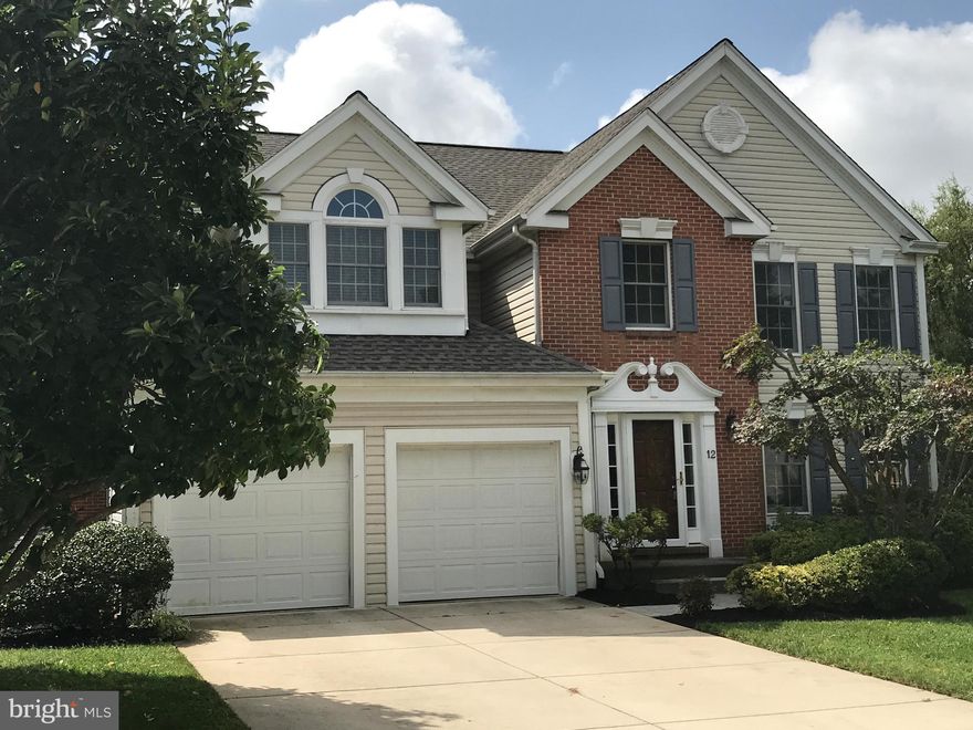 WHAT A BEAUTIFUL 4 BEDROOM COLONIAL IN LUTHERVILLE!  BRAND NEW ROOF!  BRAND NEW LOWER LEVEL CLUBROOM! BRAND NEW BATHROOM!  NEW CARPET THROUGHOUT!  RECENTLY NEW KITCHEN AND APPLIANCES!  MASTER BATH WITH SEPARATE TUB AND BATH! WONDERFUL TRIM IN FOYER & STAIRWAY!  LOVELY LARGE REAR DECK!  CATHEDRAL CEILING! RECESSED LIGHTING! WOOD BURNING FIREPLACE WITH MANTLE!  HARDWOOD FLOORS! WALK-OUT BASEMENT!