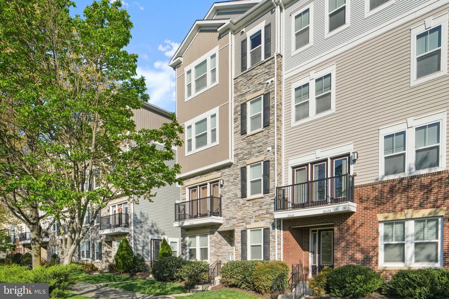 **VA Assumable Loan being offered for VA Buyers!!** Welcome home to this beautifully maintained 4 story townhouse.  Starting at the garage you are greeted with epoxy floors, storage systems and an EV charging station.  Upon entering the home, you are welcomed into a large, private mudroom while your company enters from the front door into a large hardwood foyer.  Heading up to the first level which is hardwood, you will experience plenty of natural light boasting throughout the main living space.  The bank of large windows brighten the space but also allow for customizable privacy with multiple window treatment features of top down, bottom up shades.  The open floor plan is the perfect space for entertaining or a quiet relaxing night in.  The large island seats 4 guests and there is also a designated dining space for additional seating.  The pantry has custom build it shelves with Stainless Steal Appliances in the kitchen.  Enjoy your meals and  the fall nights on your back deck with additional seating options!  

As you head upstairs, you will find the primary suite with an expansive walk in closet and an ensuite bathroom featuring two separate vanity spaces, a large walk in shower, and a separate soaking tub.  On the top level, you will have two generous sized guest rooms with a shared hall bath.  

The home is also equipped with Cat 6 Ethernet wired to each floor to ensure internet connectivity is solid throughout the house. Ethernet termination points in mud room closet, great room closet, great room behind the TV mount, master bedroom, and the 2nd bedroom and  Channel in wall (3), in ceiling (4) speakers, and a definitive technologies subwoofer, in the great room to support surround sound for great room TV. The speakers and HDMI connections are located in the great room closet to hide wires and provide a clean look for the room overall.

The community also has many features to included beautifully maintained grounds, an outdoor pool, basketball courts and a community center.  Across the street you can find the public library, restaurants, Harris Teeter, and a cozy coffee spot. The community is just off Rt 50 for easy access in and around the NOVA area and 20 minutes to Dulles International if you need to fly out!

Fresh paint, dishwasher and microwave in 2025! 

This move in ready, end unit townhome is not to be missed!