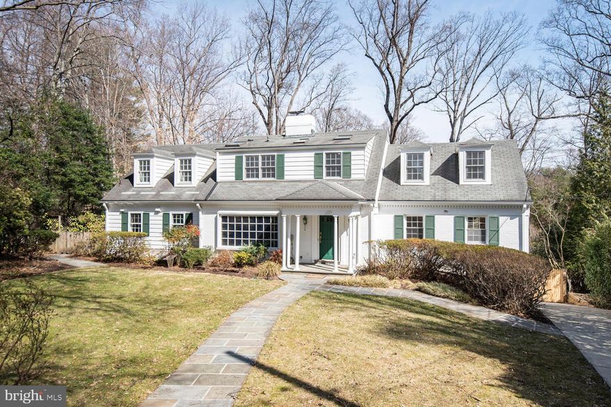 7301 Burdette Ct is quietly tucked away on a private cul-de-sac, sitting on nearly a half-acre lot, providing peace and tranquility all while being just minutes from downtown Bethesda and Washington DC. This 4,800sq/ft home with 5 spacious bedrooms and 4.5 beautiful bathrooms spread out over three levels offers an ideal floorplan for all. The main and upper level of this home feature hardwood flooring throughout, with tile in the foyer, kitchen, and breakfast room. The kitchen features granite counter tops, center island, stainless steel appliances with gas range, and new light fixtures. There is a first-floor primary suite with ensuite bathroom, large walk-in closet, and balcony. Alternatively, you have a second-floor primary suite option with a built-in desk, large walk-in closet, and ensuite bathroom. The lower level has an amazing home office space with built-in desk and shelving. The home has multiple outdoors spaces including two slate patios, one at the rear of the home and one at the side of the home, and a large grassy front and backyard. This home feeds into Burning Tree, Pyle, Walt Whitman.