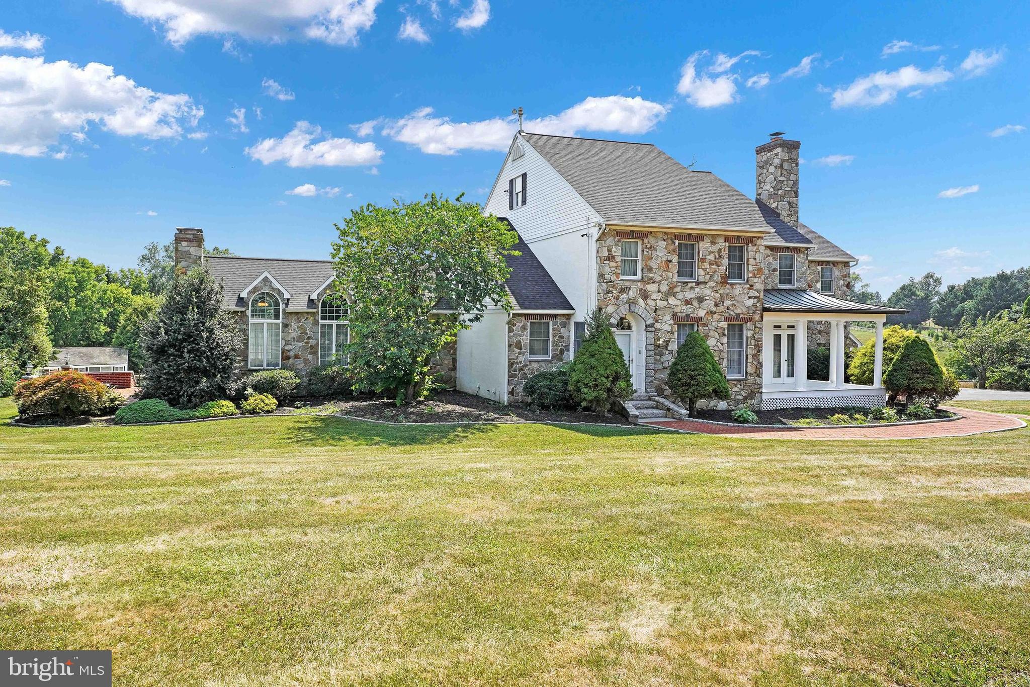 Seller offering buyer a 2/1 buydown. First year mortgage will be bought down 2% and second year 1%. This could be an approximate $2000/mo savings depending upon mortgage amount. Seller also offering buyer an $18,000 credit at settlement for payment of first years taxes! This property would be an incredible BNB. Plenty of private space, four kitchens, pool house, finished lower level and more. Also a great home for a multi generational family Once in a lifetime custom executive retreat. Why go on vacation when you can live in a vacation home? Plenty of room for a gym , office and more. Spend summer afternoons in the beautiful heated Gunite pool complete with waterfall and pool house which has a kitchen, full bath, heat and A/C . Perhaps relax in the sunroom or one of 5 porches or patios with a good book. The brick patio on the side of the home has a gorgeous exterior fireplace with granite steps and wall toppers from the 30th Street Station in Philadelphia. Entertain in the incredible outdoor kitchen area complete with running water, built in BBQ and fridge. No expense has been spared while remodeling this home over the years which totals approx $500,000 ; from the real stone exterior, copper roof, 400 sq ft fenced animal sanctuary with HVAC for your chickens, goats or maybe a pot bellied pig, to the 150kw commercial generator backed up with a 20kw generator so you are never without power. 600 AMP PECO service to the home, all of this and two efficient Geothermal systems (one is brand new 7/24) with 10 separate zones. Finish off the day in your very own 10 person movie theatre complete with 168" screen , projector, reclining theatre seats and another full bath. Enjoy the large billiard room complete with fireplace, sauna and hot tub in the walk out lower level. This level has a large summer kitchen for those pool parties. For the car enthusiast there is a 4 car attached heated garage. 3 owned propane tanks, 2 wells, hurricane brackets on every roof strut and truss. New roof in 2022. Over 7700 sq ft above ground. Well built, well maintained and ready for its new owners to enjoy! Just move in and enjoy the experience. For a complete list of upgrades please see disclosures and additional information sheet. Too many to list here.