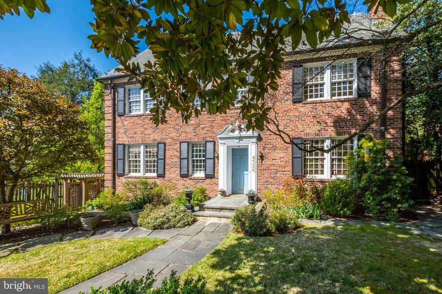 Gracious, brigh three level colonial offers 3,800 sf of living space with lush garden views on 11,700 sf level lot.  Vintage detail includes 12-over-12 sash windows, elegant marble foyer, distinctive curved staircase with ironwork railing, high ceilings, hardwood floors and three fireplaces.  Expansive living and dining rooms provide good entertainment flow to screened porch off rear, elevated deck.  Private library with pocket doors faces the kitchen -- renovated and expanded in 2009 with cherry cabinetry, granite counter tops, stainless steel appliances, breakfast island, wet bar and table space with bay window seat.  A spacious primary bedroom, three additional bedrooms and two baths comprise second level; two bedrooms, one bath and extra storage the third.  Laundry and powder rooms, storage, and yard access from original garage complete lower level.  Meticulously landscaped with off-street parking for 2-3 cars.  By Appointment.