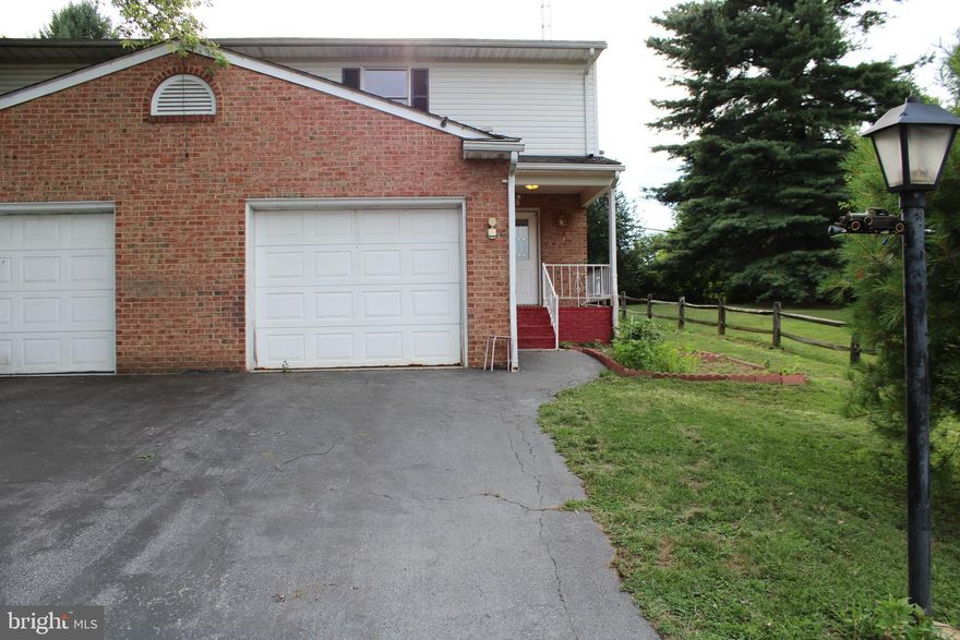 FRESHLY PAINTED!!!Motivated seller, bring your offers!This duplex has everything you need:, extra room, bathrooms, parking and most of all location. It is conveniently located minutes away from stores, medical centers & hospital, and community college. Spacious main level is made up of entrance space, half bath & laundry room, kitchen, dining area, living room and a small addition that stores the hot tub. Upper level is comprised of two spacious rooms with tall ceilings and lit closets, full guest bathroom, and big master bedroom with full bath and two lit closets. Hardwood floors are laid throughout main and upper levels . Duplex also offers a garage with inside entrance and finished basement with a built in bar to entertain your guests. Come take a look at this beautiful property that has so much to offer. You will not be disappointed.