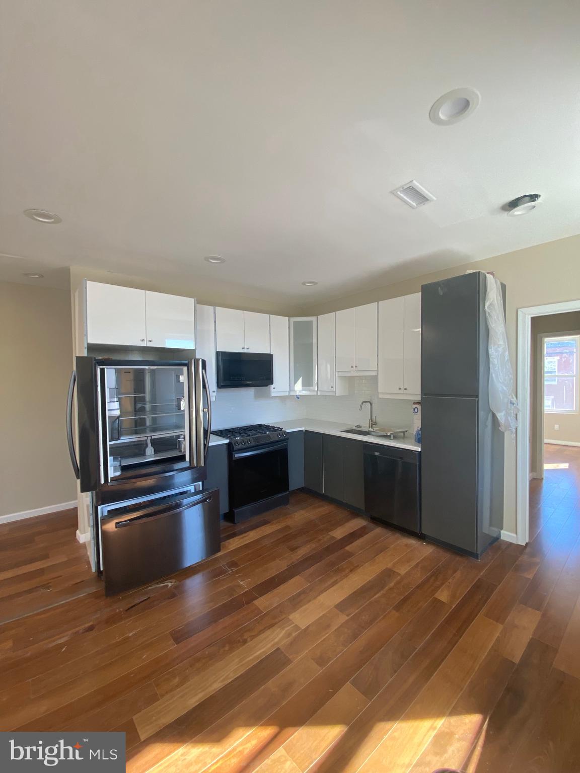 NVESTOR SPECIAL– Partially Renovated 7 BR/5 Bath Federal style Triplex in Prime Baltimore Location!! Opportunity knocks! This partially renovated End Unit dwelling in the heart of Baltimore, MD is perfect for the savvy Ca$h Buyer looking for their next flip or buy-and-hold project. ONLY vacant property on the entire block. Some of the heavy lifting has already been done, saving you time and money. ALL PERMITTED work completed includes: 1. ASSESSMENT & PLANNING: City has inspected all issues, including structural problems, code violations, and potential hazards 2. PLAN DEVELOPMENT: Renovation plan with approved Drawings have been completed 3. DEMOLITION Old fixtures, flooring and materials have been disposed of for you by licensed GC 4. INTERIOR ENHANCEMENTS: Updated electrical, rough-in plumbing, HVAC system by licensed GCs 5. FLOORING, WALL & TRIM: Installed new flooring, drywall, and trim in Brand New Ktichen Property features: Solid bones with high ARV potential Located in the rapidly developing neighborhood of MdElderry Park with strong rental/resale demand Spacious layout ideal for a high-end rental addition to an Income Producing property portfolio This is a distressed property being sold As-Is, and is priced to move quickly. Bring your contractor and vision — the upside here is real for those ready to act fast. Serious Ca$h Buyers only. Don’t miss out on this Baltimore gem with built-in equity waiting to be unlocked All sqft is approximate and not to be used for property valuation. This property is being sold in As-Is condition. Ground Rent holder is unknown at this time. The Seller would like to settle quickly and prefers a CASH sale. If you would like to have a Home Inspection, please do so BEFORE submitting an offer.