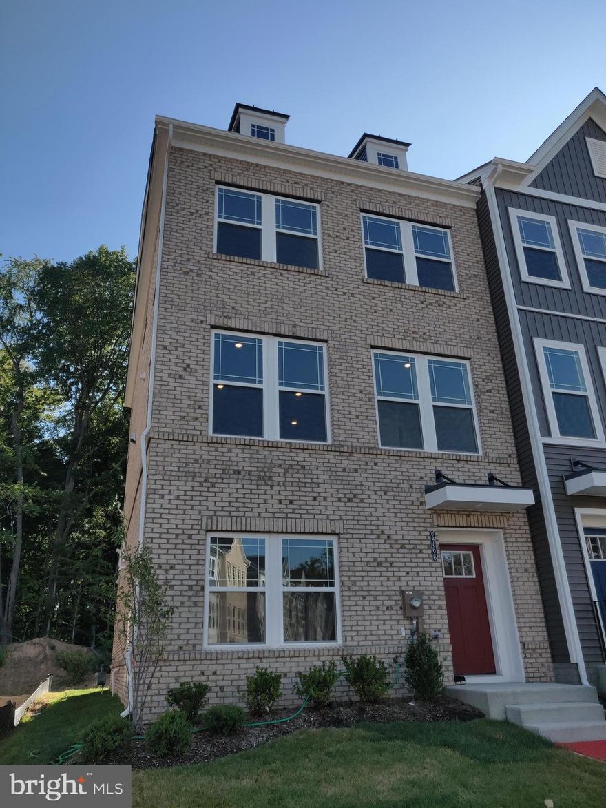 Luxury brand new end unit townhome offers 3 bedrooms, 2 full bath2, 2 half baths, 2-car garage. Brick front and side. Back to woods. Kitchen level features open floor plan living area with large island, wide plank flooring, stainless steel appliances and granite countertops. The lower level contains an additional sitting room and powder room. Top level features 3 bedrooms, 2 full bath W/I closet and laundry room. Quiet neighborhood, back to forest. Community entainetment spaces.  HOA covers grass cutting. Large deck. Washer, dryer to be installed soon.