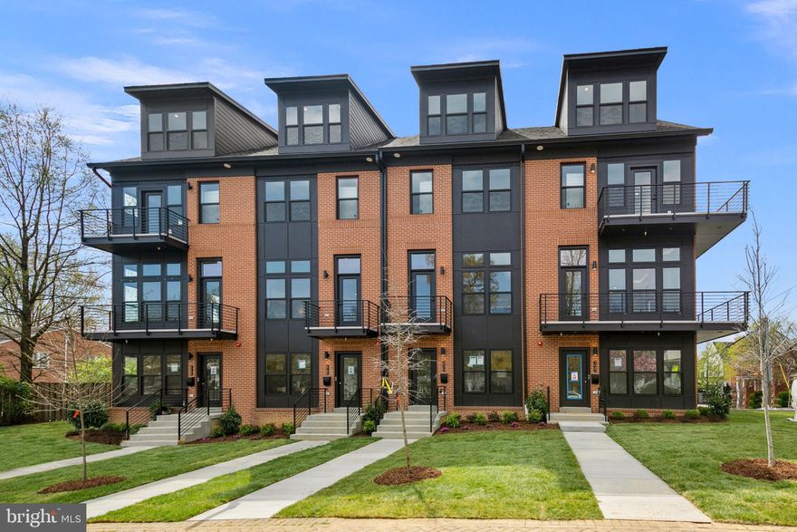 Welcome to 2770 11th St, where modern elegance meets urban convenience in Clarendon's latest development, Row 11. As one of only two remaining new townhomes, this residence epitomizes contemporary living at its finest. Step inside to discover a seamlessly integrated open-concept layout across four levels, featuring soaring 10-foot ceilings on the main level, hardwood floors, and large windows that flood the space with natural light. The kitchen showcases sleek quartz countertops, custom cabinetry, and top-of-the-line stainless steel appliances, perfect for culinary enthusiasts.
Enjoy the convenience of a private 2-car garage, ensuring parking is always hassle-free. Retreat to the luxurious master suite boasting an oversized walk-in shower, offering a spa-like experience right at home. Designer finishes throughout the home add a touch of sophistication to every corner.
Ascend to the rooftop deck to unwind or entertain while taking in panoramic views of the surrounding neighborhood. Interior construction just completed, setting the stage for a move-in-ready experience, with full occupancy available within the next 14 days. Positioned just 3.5 blocks from the metro, commuting is a breeze, while being mere steps away from Clarendon's vibrant dining and shopping scene ensures endless entertainment and convenience at your doorstep.
Don't miss out on the opportunity to make this sleek urban retreat your own. Schedule your viewing today and experience the epitome of modern living at 2770 11th St.