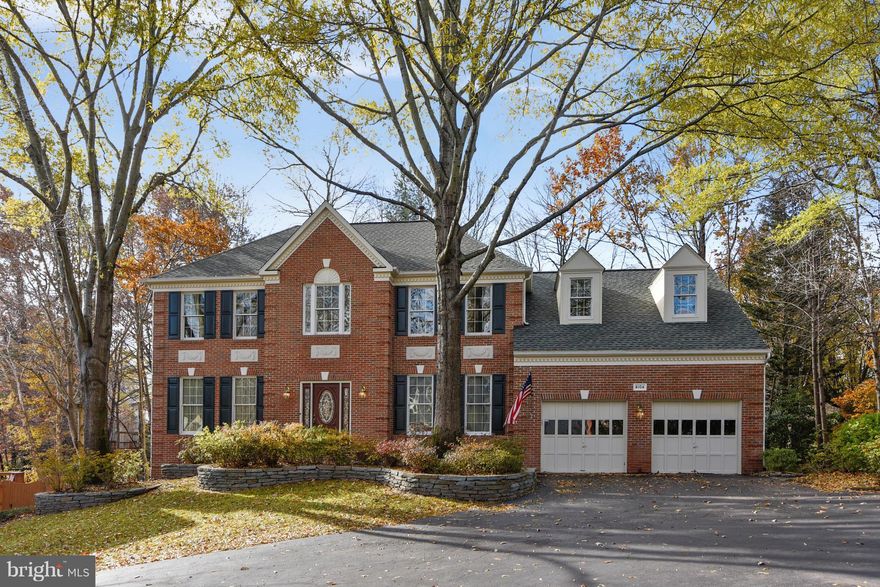 Elegant and stunning Barrington beauty! Tucked into a quiet cul-de sac, be delighted as you pull up to the stately Colonial and be welcomed by the professional landscaping and beautiful flagstone hardscaping that leads you to the front door. Enter into the two-story grand foyer with curved staircase and dramatic lighting. Freshly painted expansive interior featuring 9' ceilings, beautiful wood trim work and hardwood floors on all three levels of the home. Beautiful main living area with a bright and open kitchen, breakfast area and light-filled family room with a soaring brick wood-burning fireplace and vaulted ceiling.  Home office with double-doors,  half bath, dining and living room are also on main. The kitchen features gourmet touches including massive walk-in pantry, island cook-top, double oven, ample cabinet space and recessed lighting. Laundry and mud room lead to the garage that features custom closet systems, showroom interlocking floor tiles and overhead storage. Upper level offers 4 spacious bedrooms, 2 full baths, a large master bedroom with impressive luxury built-in walk-in closet system with custom lighting, master bath with large soaking tub, shower, double vanity and two linen closets. Fully finished lower level offering a full bath, great room with french doors leading to brick patio, 5th bedroom with walk-in closet, workout room, and storage room. Large deck leading to brick patio for outdoor entertaining. This is a meticulously maintained, gorgeous home you won t want to miss! Enjoy the community pool, swim team, community holiday parties and community social groups as you please in this sought-after community! Convenient to South County schools, dining, shopping, major commuter routes, Fairfax County Parkway, VRE, and two local parks with trails-Lake Mercer and Burke Lake.