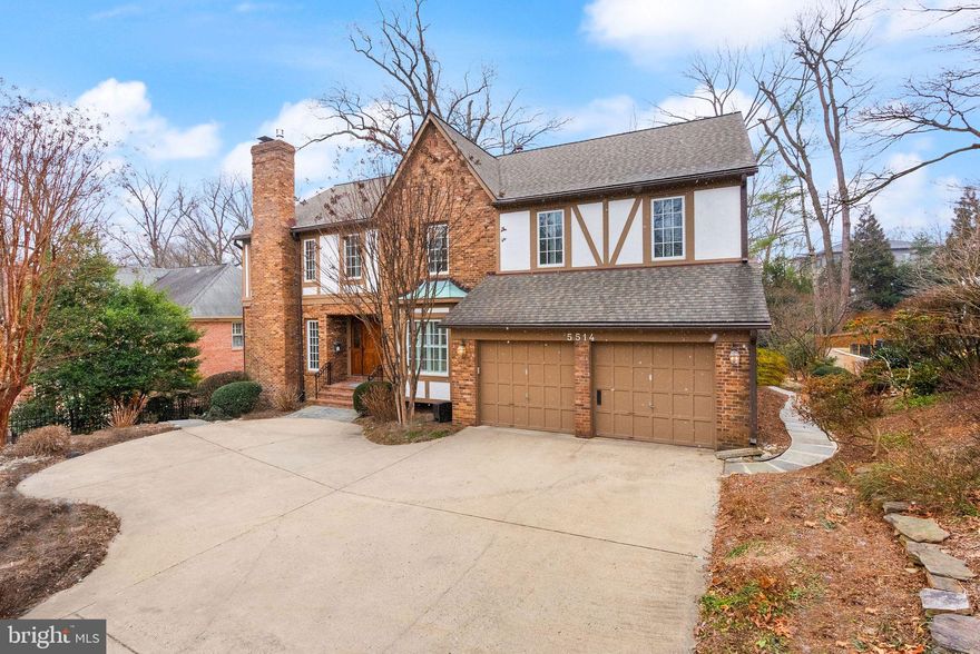RARE OPPORTUNITY IN SOUGHT-AFTER NORTH ARLINGTON! Step into a world of timeless elegance and modern luxury with this beautifully maintained 5 bedroom, 4.5 bathroom Tudor style home. Nestled on a beautifully landscaped 10,098 sq. ft. lot, this home offers an expansive 5,008 sq. ft. of living space across three levels, designed to impress at every turn. From the moment you enter, you'll be captivated by the fine finishes, intricate crown moldings, and gleaming newly refinished hardwood floors—all set within an open and inviting floor plan that flows effortlessly. Stepping through the elegant covered entry into the spacious foyer, you are flanked by the formal dining room to the right with its large bay window and the formal living room to the left with its cozy wood-burning fireplace. Pass through the French doors into the well-appointed office with a wall of custom built-ins and a separate wet bar. Straight ahead of the foyer, your eyes are drawn to the inviting great room with its vaulted ceiling, skylights, and gas fireplace with raised hearth and dramatic floor-to-ceiling stone surround. The sizeable great room is open to the breakfast area and updated kitchen featuring a 6-burner gas cooktop and stainless refrigerator, glass front cabinets with under cabinet lighting, granite countertops, and access to the laundry room/mudroom and walk-in pantry. Accessible through the breakfast area is an oversized 3-season room drenched in southern-exposure sunlight through window-lined walls and multiple skylights with retractable shades. The French doors of the 3-season room lead to a multi-tiered deck that runs the entire length of the back of the home and include built-in seating, wired lighting, a hot tub, and a flagstone patio. PERFECT FOR YEAR-ROUND ENTERTAINING! Meander up to second floor and through the double doors into the primary retreat complete with a private sitting room/2nd office, separate his-and-hers walk-in closets, and a spa-like bath with double vanity, soaking tub, and heavy-glass enclosed shower. Three well-sized secondary bedroom, two with walk-in closets and a Jack-and-Jill bath, and a shared hall bath complete the second level. Heading downstairs you’ll be greeted by a large rec room with  Gas fireplace, numerous custom built-ins, wet bar, full bath, a fifth bedroom perfect for guests or an au pair, and French door leading directly to the large flagstone patio. A huge, unfinished storage space is a blank canvas—imagine a home theater room, exercise room, or creative studio! SUSTAINABILITY MEETS SAVINGS: photovoltaic solar panels (installed in October 2023 and paid in full) include transferable 25-year limited warranty on parts and 10-year warranty on installation). Roof (2019), solar shades in sunroom skylights (2020), primary bath renovation (2009), water heater (2017), basement heater (2024), upstairs 2-zone heat pump (2015). Marvin windows throughout (2009). Plantation shutters on virtually every window. Abundant storage throughout. 2-car garage. Conveniently located just minutes to Washington Golf and Country Club, popular Chestnut Hill park, and the Chain Bridge, for easy access to Washington D.C. Close to all the amazing shops and restaurants in downtown North Arlington. Schools all within ¾ mile: NOTTINGHAM ES, WILLIAMSBURG MS, YORKTOWN HS