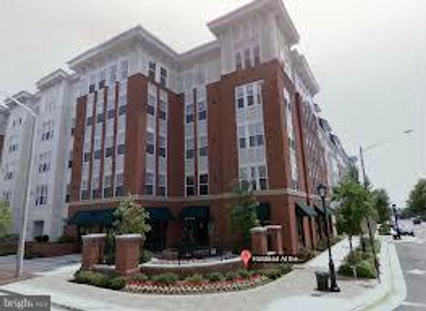 Gorgeous!Sought after quiet top floor end unit away from Metro noise. Newly painted, newer berber carpet.Two parking spaces in secure community with concierge service, party room, pool with lifeguard, high end fitness center, conference room, gym, business center, sports room.  Won't last!