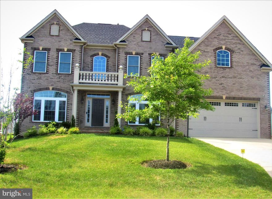 Look no further, this Exclusive Remington model home built by NV Homes is waiting for a new owner to call home.  The Remington is one of the largest models built by NV Homes. It is sited in a community of luxurious single-family homes that line private amid neighborhood ponds and hiking and biking trails. Tons of upgrades & amenities abound: 4 bedrooms, 3.5 baths, 2-story overlook family room with high ceilings & gas fireplace.  Hardwood floors, separate living and dining, double stairwells,  office room, crown moldings, custom designed wall paper, gourmet kitchen, remote blinds, granite counter tops, butler's pantry, huge master bedroom, siting room, balcony off the master bedroom, en-suite master bath with separate shower & soaking tub & his/hers vanities, his/hers closets, finished walkout lower level with media center, bar/game room, unfinished area can be finished for a 5th bedroom/hobby room, spa shower, yard sprinkler system, custom deck, built-in humidifier in the HVAC system.  Community amenities include: recreation facility w/ swimming pool, tennis courts, pool house, biking trails and more.  The elegant 3-level home features many bells and whistles any Buyer would absolutely adore.