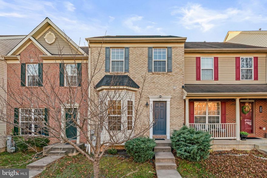 Welcoming townhouse residence offering 3 bedrooms, 2 full bathrooms, 2 half bathrooms, and 2,244 finished square feet in desirable Autumn Run. The main level features a foyer complete with a powder room, a coat closet, and hardwood floors that directly open to the spacious living room, accented by a charming bay window. Continue into the open-concept and sunny dining and kitchen area, where the dining area provides slider access to the back deck. The eat-in kitchen is equipped with a breakfast bar, a center island, a pantry, chic stainless steel and black appliances, and ample cabinet and counter space—perfect for cooking and everyday living. Upstairs, you’ll find three comfortable bedrooms, including the spacious primary suite with a sitting area, double walk-in closets, and a recently refreshed private bathroom featuring double sinks and a large corner soaking tub. A second full bathroom is centrally located and serves the additional bedrooms. The lower level offers even more space with an expansive recreation room, a versatile bonus room ideal for guests or a home office, a powder room, and a storage area with laundry facilities. Outdoor living includes a deck with stairs leading to the fenced backyard, which backs to open green space and a scenic trail. Community amenities include well-maintained common areas, picnic spaces, playgrounds, and two reserved parking spaces for residents.