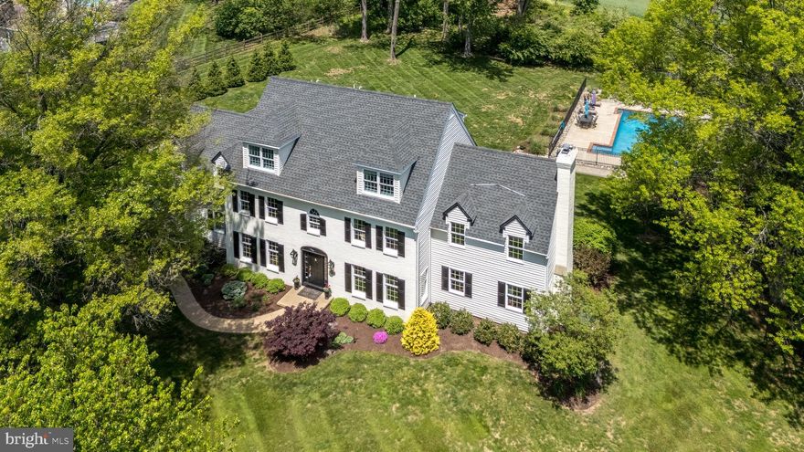 Welcome to Fox Hunt Estates at 4976 Gloucester Drive, Doylestown, PA, an elegant 5,500+/- square foot home boasting 7+ bedrooms and 5.5 baths with a recent addition of a  main floor In-Law suite. This residence perfectly balances sophistication with comfort, featuring hardwood floors throughout the first floor, a spacious family room, inviting living room, and formal dining room with a huge updated entertaining kitchen. The back wall of full windows & doors in the Family Room and Kitchen bring the outdoors inside.

The second-floor primary en-suite offers a private retreat, complemented by additional bedrooms, the laundry room , office  and hall bath, including multiple bedrooms and two full bathrooms on the third floor.

The newly added au pair or in-law suite on the main level includes a bedroom, full bath/laundry, kitchenette/family  room with a private entrance, enhancing the home’s versatility. The finished lower-level basement provides ample space for recreation and hobbies, along with essential storage areas.

The recently updated deck and bluestone hardscaped terrace leads to a beautiful pool and expansive yard, creating a perfect outdoor haven. The back of this property adjoins to a preserved farmland. The sellers have enjoyed the mini woods for their bonfires - it could be cleared for a direct open view to the preserved land. 

Enjoy the updated amenities(there is a list of multiple upgrades available) of this luxurious lifestyle with its prime location and exceptional features.
