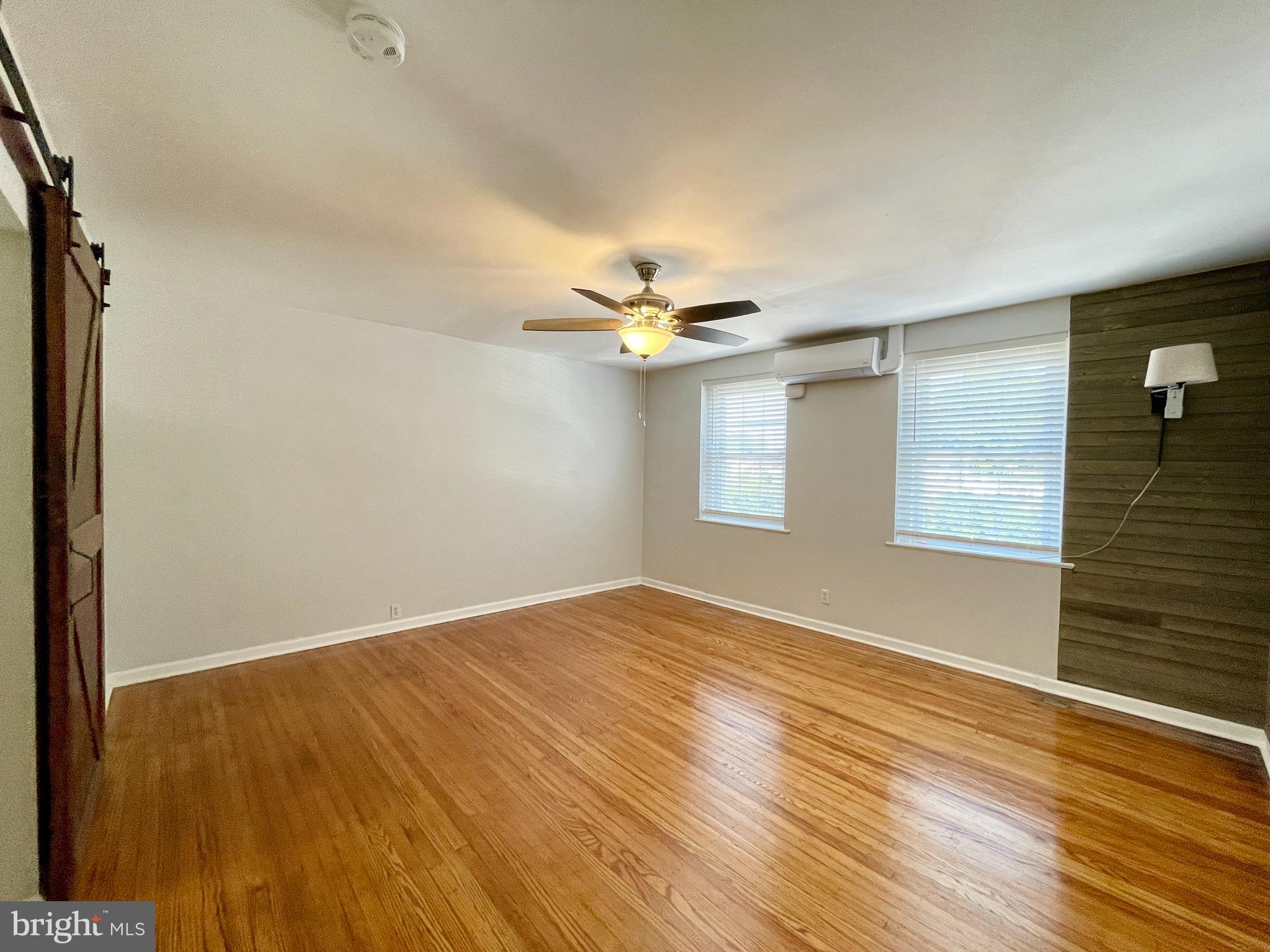 Newly renovated second floor efficiency apartment. This sun-filled unit features a newer kitchen, separate living/sleeping area, and an updated tile bath with skylight. Additional amenities include central A/C and refinished hardwood flooring. Heat, A/C, and water are included in the monthly rent. Close to shopping and public transportation. Move-in ready. Call to schedule a showing today. Tenants, please apply through the RentSpree link (provided by listing agent).