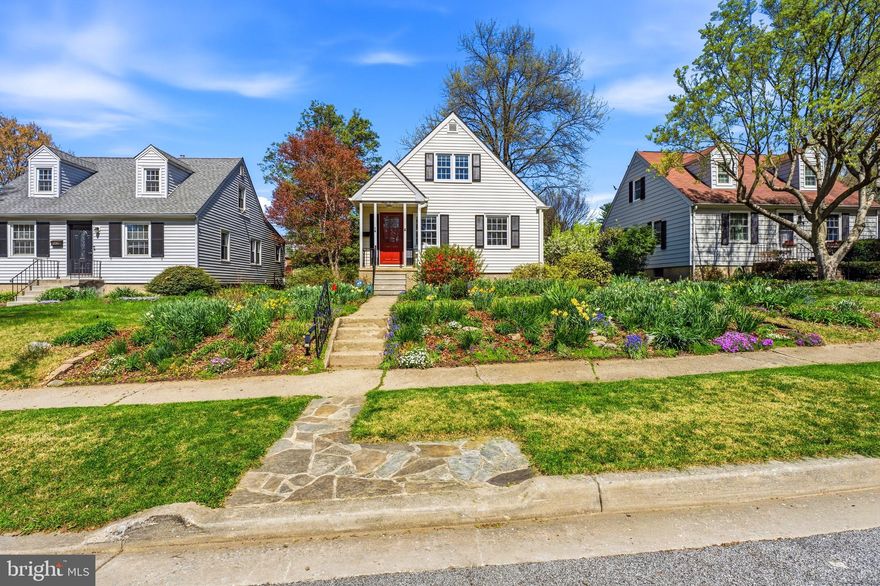 Welcome to this beautifully maintained and thoughtfully updated 3 bedroom, 1.5 bath home in Greenbrier!   From the moment you arrive, you'll appreciate the lush landscaping, backyard privacy, and inviting curb appeal in this walkable neighborhood.    Inside, the light filled rooms throughout the first and second levels shine with refurnished hardwood floors.  The home dazzles with a fully updated extra-large galley kitchen with solid wood cabinetry, stainless steel appliances (GE profile convection oven & 36 inch French door refrigerator!), and quartz countertops.   Outdoor access is easy through new ProVia entry doors, or relax and enjoy garden views out the new oversized awning window in the kitchen.    Home has a newer electric panel, upgraded electrical (lots of outlets, quiet rocker switches, & Lutron dimmer switches!), and a newer (2022) HVAC system with a platinum carbon UV air purification system.    Enjoy energy efficiency as all the custom Hunter Douglas window shades throughout the home are staying!     Home boasts a first floor master and two spacious second floor bedrooms that share a hallway ¼ bath.    The flexible basement provides a large recreation area with new glass block windows, 12x24 porcelain tile, bright LED lighting, and a convenient half bath.   Additional improvements include basement waterproofing, new insulation, upgraded Hudson Valley lighting fixtures, and run-so-quiet Atlas fans in the upstairs bedrooms.    A large attic antenna provides free digital TV,  a cedar closet in the upstairs bedroom adds character and convenience, and hardwired smoke detectors on all levels provide safety.   Step outside to a gorgeous yard with mature trees perfect for entertaining or unwinding.   Privacy is yours to have in this backyard or alternatively adventure out to local restaurants and entertainment a short walk away.   Location, Location, Location!   This home truly checks all the boxes!