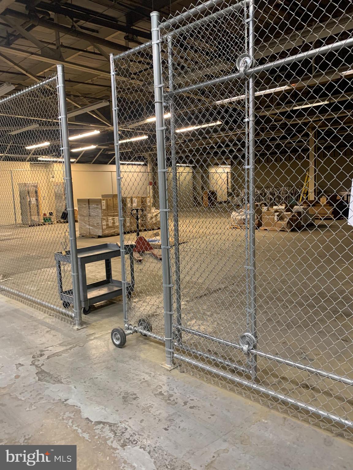 YES, THE BASE RENT IS $1.00 PSF. CAM AND UTILITIES ARE IN ADDITION. SUBLEASE OPPORTUNITY.
Suite B is an Industrial/Flex space located in Building 2 of Burle Corporate Park. This is a dry storage space enclosed by chain link walls. It has sprinklers, central air conditioning, and 24-hour security systems. The tenant has access to shared hallways, restrooms, cafeteria and outside courtyard. This is a sublease with multiple years remaining on the lease, the rate is negotiable.