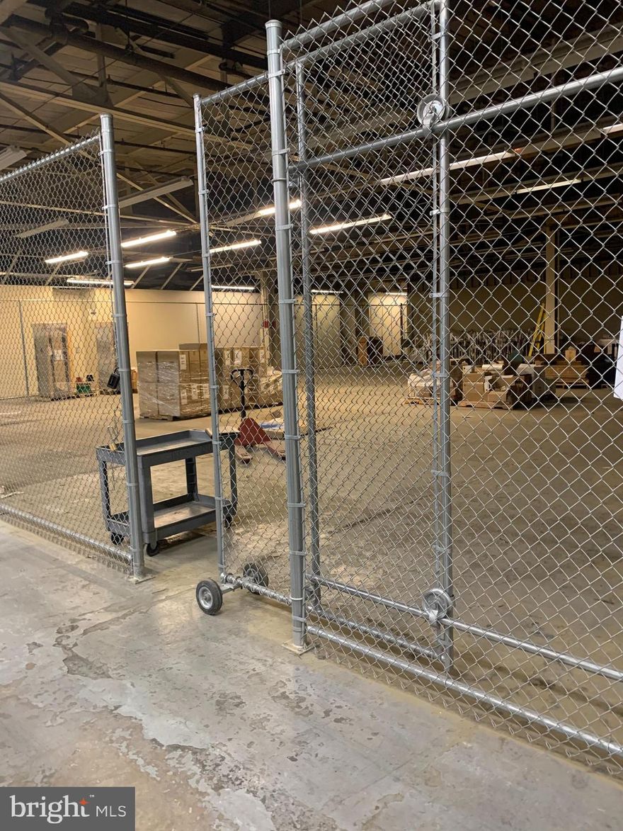 YES, THE BASE RENT IS $1.00 PSF.  CAM AND UTILITIES ARE IN ADDITION. SUBLEASE OPPORTUNITY.
Suite B is an Industrial/Flex space located in Building 2 of Burle Corporate Park. This is a dry storage space enclosed by chain link walls. It has sprinklers, central air conditioning, and 24-hour security systems. The tenant has access to shared hallways, restrooms, cafeteria and outside courtyard. This is a sublease with multiple years remaining on the lease, the rate is negotiable.