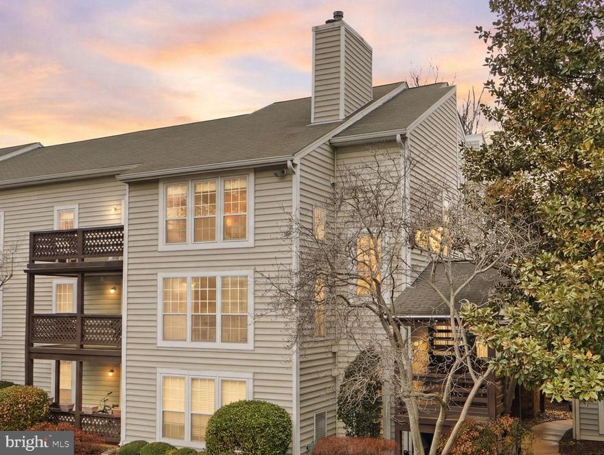 This is the one you've been waiting for. Not your typical cookie-cutter condominium. Designer Owner has taken great care in updating and modernizing this wonderful space. Open concept floor-plan invites you in and instantly makes you feel at home. Fine finishes sooth your mind. The home is adorned with hand-scraped hardwood floors and a warm wood-burning fireplace in addition to waterfall style Quartz counters, lux style lighting fixtures and upgraded door hardware. Turn-key ready, just move right in. Featuring two bedrooms with plenty of closet space, a private sun-drenched balcony for morning coffee or an after work cocktail. Sit down, relax and enjoy the peaceful atmosphere. Located mere minutes to downtown Oakton and the upscale shopping or fine dining options in nearby Tysons. It is truly a commuters dream with the Vienna Metro, I-66 and Route 50 must moments away. Don't wait, make this one a priority to see, then make it yours.