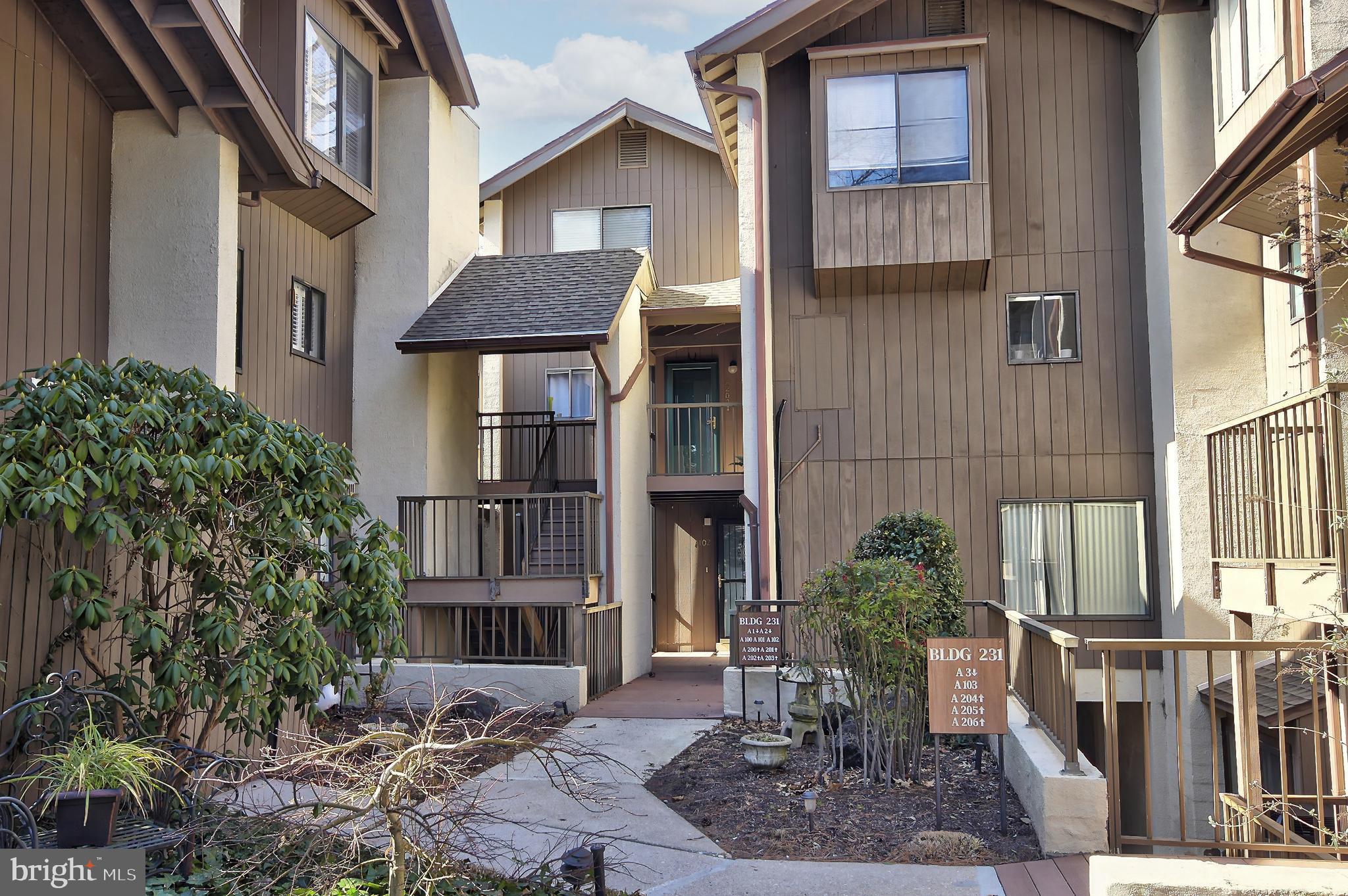 Move in ready! This two-floor condominium is ready for its next owner! The main floor living area has a living room, kitchen, dining room, two bedrooms (one with built-in lower cabinets and upper display shelving), a full bath with a tub/shower combination, laundry closet, and several storage/coat closets. The upper level has an open area that looks down into the living room, which could be an office/additional sitting area, a primary bedroom with an ensuite bathroom. The home's walls are adorned with eye-catching textured grass cloth wallpaper and printed wallpaper, bringing warmth and style to each room. Make your appointment today!
