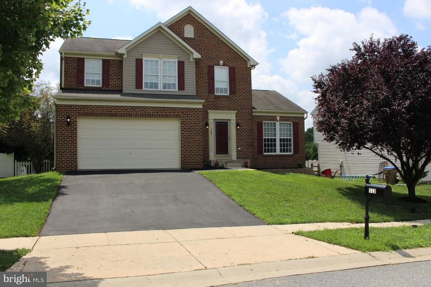 MULTIPLE OFFERS - Best and Final Offers Due No Later then Saturday, August 1st by 3pm.  Welcome home to this 4 Bedroom, 2.5 Bath, 2 Car Garage brick front Colonial. This original owner home is located in desirable Bryan's Grace in Rising Sun. The features in this house are endless with an open layout, upgrades and lots of natural light. You will be entertaining on the large deck overlooking the fully fenced rear yard or in your gourmet kitchen with 42" custom cabinets,  brand new stainless steel appliances, a breakfast bar and an oversized island situated right between the family room with a gas fireplace and the huge sun room with walls of windows. In addition, the main floor includes a living room and a half bath. The upper floor offers 4 bedrooms and 2 full baths. The master bedroom has a walk-in closet, a great sitting area and cathedral ceilings. The master bathroom offers dual vanities, a jetted soaking tub and a separate shower. Additional amenities include corian countertops, crown molding, composite decking, vinyl fencing, and a full basement with a rough in ready for your finishing touches. Look at the pictures, check out the schools and schedule a showing today before it's gone.