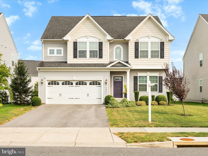 **Brand new carpet installed on the second level.** Welcome to this stunning 4-bedroom, 2.5-bathroom home in the highly sought-after Ballenger Run community—where modern upgrades meet comfortable living! Step inside and you’ll immediately notice the hardwood floors throughout the main level, creating a warm and inviting flow. A formal dining space sets the stage for holiday gatherings and special occasions, while the large family room opens seamlessly to the gourmet kitchen—perfect for entertaining. The kitchen boasts a large extended island, upgraded countertops, a custom backsplash, plenty of cabinet space, upgraded lighting, and pantry with a sliding barn-style door. A bright sunroom bump-out overlooks the spacious backyard, bringing in plenty of natural light. Upstairs, the primary suite is a true retreat, featuring a custom-built headboard, a spa-like bathroom with a walk-in shower and double vanity, and a large walk-in closet. Three additional well-sized bedrooms, a full bathroom, and a convenient upstairs laundry room with ample storage complete the upper level. The lower level basement is full of potential, offering a rough-in for an additional bathroom and flexible space that could become a game room, playroom, home gym, or an extra bedroom. Step outside to your very own custom-built stone patio, ideal for summer nights, barbecues, and gatherings with family and friends. The large yard provides plenty of space to enjoy the outdoors. All of this in a prime location—just minutes from downtown Frederick’s shopping, dining, and entertainment, with easy access to I-270 and I-70 for commuting. This Ballenger Run beauty truly has it all—space, upgrades, and location. Don’t miss your chance to make it yours!