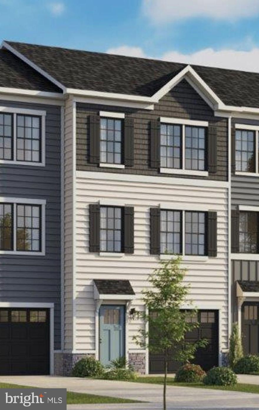 Explore the contemporary Adams townhome design by D.R. Horton, offering a cozy and stylish living space of 1,889 sq. ft. with 4 bedrooms, 3.5 bathrooms, and a 1-car garage. This property boasts upscale amenities like granite countertops, sleek stainless steel appliances, and elegant recessed lighting in the kitchen. Benefit from D.R. Horton's innovative smart home features, attractive below market interest rates, and substantial closing assistance, providing exceptional value. Personalize the lower level bonus area as a rec room, home office, or 4th bedroom to align with your lifestyle. Noteworthy features of the Adams design comprise expansive 9 ft ceilings on the main level, a spacious kitchen island, premium maple cabinets, stainless steel appliances, luxurious plank flooring, and the incorporation of the Home is Connected technology package.