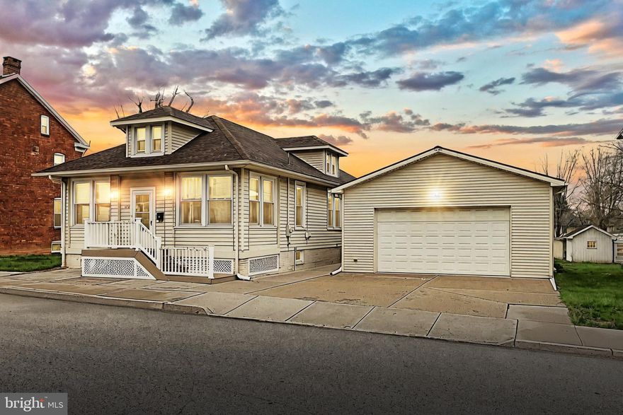 Tired of renting and ready to own? Offered for the first time in over 50 years, this cherished home has been under the continuous care of the same devoted owners, reflecting decades of pride, maintenance, and thoughtful upkeep. It’s not flashy—it’s better. It’s solid, dependable, and full of heart—offering you peace of mind and a chance to make it your own. Inside you'll find charming details, 3 bedrooms and 1 full bath. One bedroom is currently being used as an office and in keeping with the iconic era of when the house was built, does not include a closet. An upper level attic room for storage and an enclosed front porch add valuable flex space. Set on a DOUBLE LOT, there’s plenty of room outdoors to work with, a deck, shed, plus ample off-street parking front and alley-side for added convenience. The roof was replaced with architectural shingles in 2014, and the Central Air was updated in 2023. A 24x40 detached two-car garage with a man door offers extra space and versatility whether for storage, projects or hobbies.  Whether you’re looking to stop renting or simply want a home with history and heart, this property offers a smart investment in your future.