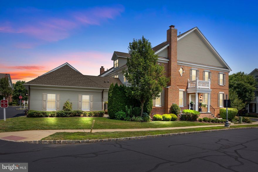 Welcome to this spacious and thoughtfully upgraded end unit corner townhome tucked back in a desirable location within prestigious Newtown Walk. This updated Sequoia model has many special features including amazing sun exposure, custom wood louvered shutters on most windows, two panel solid core doors, upgraded maple hardwood flooring throughout the first and second floors, vaulted ceilings in the main bedroom and bath, a finished basement with tons of storage and a fabulous kitchen!  Mouser Cabinetry, a 10' island with quartz countertops, under and interior cabinet lighting, Visual Comfort polished nickel lantern pendants, Bosch cooktop and warming drawer, and Ruvati sink with Grohe faucet make this a dream kitchen. The main level has an open living/dining room and adjacent kitchen/family room with breakfast area and fireplace, all providing the perfect space for entertaining, flowing out onto the private composite deck. There's also a well-appointed powder room,  large laundry / mud room off the kitchen, with brand new washer and dryer,  leading to the attached 2-car garage with epoxy-coated floor and additional storage. The second level boasts the owner's suite with a redesigned walk-in closet and stunning primary bathroom with designer porcelain tile and heated flooring, custom glass shower, hydrotherapy jetted tub, Kohler Verdera lighted medicine cabinets, and Toto toilet with heated seat, bidet, auto flush / clean and personalized settings.  There are two additional bedrooms (one with a walk-in closet), a full hall bathroom with double vanity, and bonus space at the end of the hallway perfect for a reading nook or small office. The finished basement, accessed via full view glass door, has 3 distinct areas - the main living/entertainment/playroom, a separate room for a small home gym, and sizable storage areas. The house also features a fully-alarmed security system including the 2nd floor windows, water softening system, and 3-zoned heating and air conditioning.  Walk to the charming downtown Newtown Borough with tremendous shopping and dining options. You are minutes from I-295, Trenton-Mercer Airport and trains to Philadelphia and NYC. Management takes care of all exterior maintenance and common areas, lawn, snow, trash, roads, and the convenient walking path around the neighborhood. Come be part of this vibrant Gold Star community and the Blue Ribbon-winning Council Rock (North) schools!