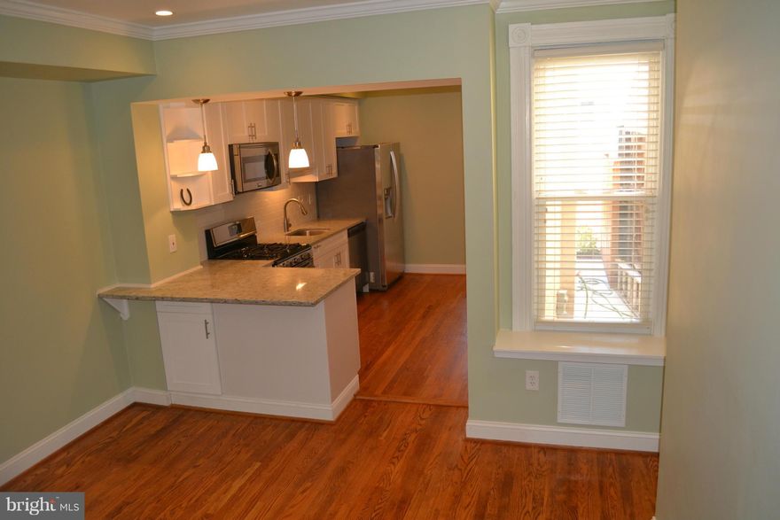 Check it out! PERFECT REHAB in HAMPDEN,HON! Buyers will love the kitchen, the colors, the floors, the brightness, the patio, the covered porch--let me count the ways! Clean and fresh basement with new systems and nice laundry area. All brand new! AND, could be eligible for "Live Near Your Work" grants etc. Block off the avenue--easy walk to everything! Don't miss it.