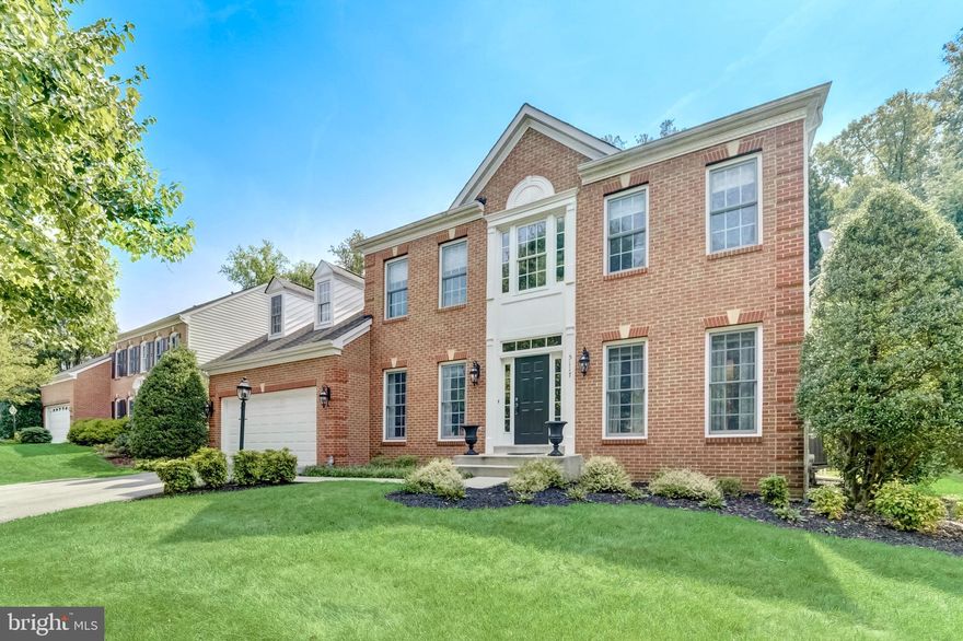 Gorgeous and lovingly cared for brick-front Colonial in the sought after Crestwood Community. Private, picturesque lot (.4 acre) backs to forest conservation area and features a custom paver patio, retractable awnings and custom designed in-ground pool with hardscape and sheer descent waterfall. One of the nicest lots in the neighborhood. Traditional floor plan features 2-story entry, formal living and dining rooms, gourmet kitchen and expansive family room with a cozy fireplace.  Three custom chandeliers by Currey & Company in the entry, dining room and kitchen will convey. The beautiful eat-in kitchen boasts tons of natural light, large island for entertaining and Thermador double ovens, cooktop and dishwasher. The upper level contains 4 spacious bedrooms including an oversized primary suite with sitting room and sizeable primary bathroom. The finished lower level provides additional entertaining space, full bathroom and tons of storage space.  Schedule your showing for this stunning home today!