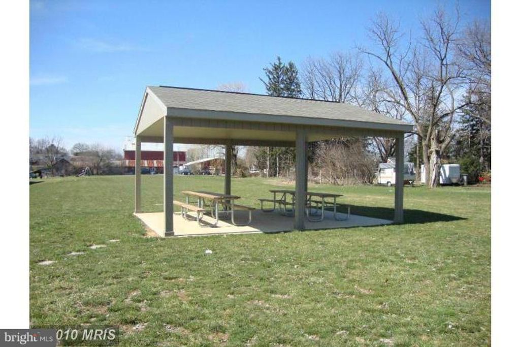 Photo of 10588 Sunburst Gardens Dr #C, WAYNESBORO, PA 17268 (MLS # PAFL2032470)