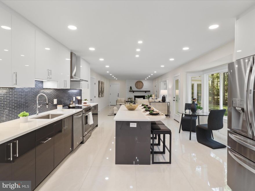 A Wonderful Opportunity to Own a Fully Renovated Luxury Home — Priced Below Appraised Value! 💰 Offered at $2,860,000 | 📊 Appraised at $2,700,000. This builder build the 1048 Rector Lane, McLean, A.  
Welcome to your dream home with 4192 sq.ft—a breathtaking, fully reimagined residence set on a 1.2-acre lot that perfectly blends modern sophistication, premium craftsmanship, and serene outdoor living. Every detail has been carefully curated and renovated with timeless design and exceptional quality.

Major Improvements & Upgrades

Exterior Highlights:
• Elegant new architectural roof & premium gutter system
• Energy-efficient JELD-WEN windows & doors
• Fresh exterior paint with refined trim detailing
• Professionally designed landscaping with ambient lighting
• New circular asphalt driveway & renovated garage
• New state-of-the-art septic system
• Expansive patio with designer lighting & Ring video doorbell

Interior Highlights:
• Gourmet kitchen with German cabinetry, Calcutta quartz island, premium GE, Bosch, and LG appliances
• Custom walk-in closet & cedar-lined closet
• Reimagined open-concept layout with luxury finishes
• Porcelain & hardwood flooring throughout
• Designer and recessed lighting
• All-new HVAC, electrical, and plumbing
• Spa-inspired bathrooms with premium tilework
• EV charger in garage

This is a turnkey luxury home—timeless design, modern comfort, and exceptional value in one remarkable property.

Beautifully designed main level with open, light-filled living spaces and breathtaking views of nature from every window. The elegant living and dining areas flow seamlessly into a spacious eat-in kitchen and adjoining family room that open to a large patio and screened porch—perfect for modern indoor-outdoor entertaining. The main-level bedroom with a full bath nearby provides an ideal guest suite or private office. An oversized two-car garage with EV charging completes this functional and inviting layout.

The upper level features four bedrooms, including a custom-built walk-in closet with ample shelving and storage. The primary suite offers generous space, abundant natural light, and a luxurious modern bathroom with a large dressing area and walk-in closet. Two additional bedrooms share a beautifully updated full bath, making this level both stylish and comfortable for everyday living.

The lower level offers a flexible layout with a bedroom or den, a full bath, and a cedar closet—ideal for guests or a quiet home office—with direct access to the outdoors. A spacious unfinished area provides endless possibilities for customization, whether creating a playroom, media room, or fitness studio.

Full floor plans for each level are available in the photos and video tour.
