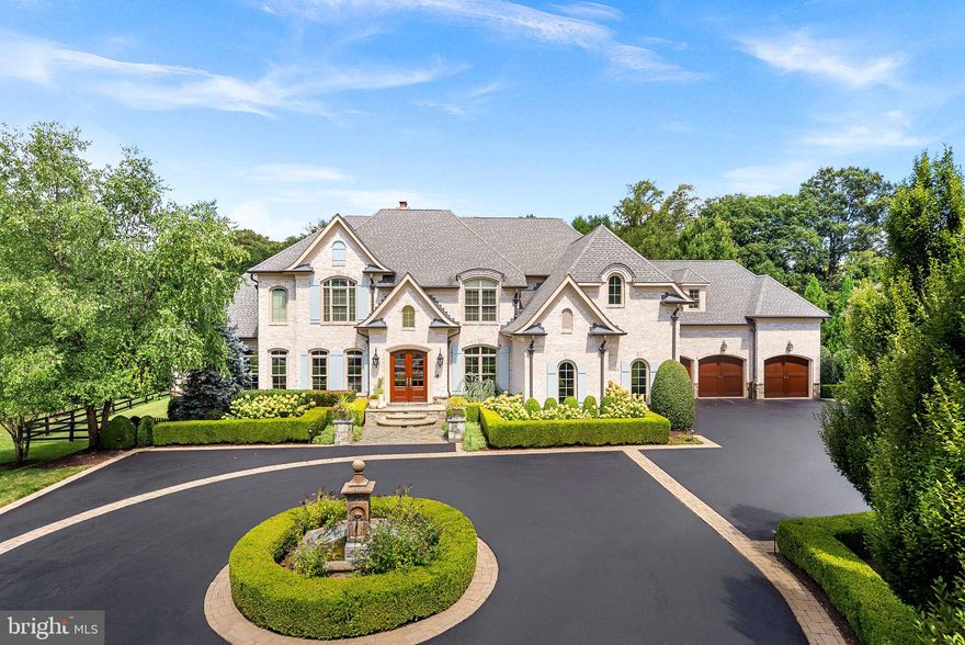 Welcome to your dream home! A custom French-style estate situated on one of the most beautiful landscaped lots in Grenata.  This exquisite property offers a grand entrance with a long circular driveway and at the center is a water fountain.  The spacious living room offers a stunning fireplace with stone surround, coffered ceiling and a large atrium window overlooking the lush landscaped grounds. Right off the family room is the gourmet kitchen featuring high-end appliances including stand alone Thermador Refrigerator, Freezer and Wine Refrigerator, two dishwashers, ice-machine and quartz countertops.  Enjoy breakfast in the morning room or relax in the nicely appointed family room with wood beamed ceilings, separate wall-bar and French doors leading to the patio and backyard entertainment area.  Unwind in the luxurious owners suite and spa-like ensuite bathroom complete with a soaking tub and shower. Two spacious designer closets round out this magnificent space. The basement boasts a variety of charming features making it perfect for both entertaining guests or enjoying a night in.   There is also a 6th bedroom and a full bathroom with adjoining laundry room.   For those who love a good game of pool, the billiard room complete with a wet bar is located on the main level and is sure to be a hit.  The stunning backyard oasis is the perfect spot to entertain. The sparkling salt water pool beckons on hot summer days, while the covered patio provides shade for outdoor dining or lounging.  A cozy fireplace invites cooler weather get-togethers, and a built-in BBQ makes outdoor entertaining easy and enjoyable. Surrounded by lush landscaping and manicured lawns, this backyard is a true haven for relaxation and fun.  This stunning French-style estate in the prestigious Grenata community offers resort-style living with all the conveniences right around the corner.   Start living your best life today!