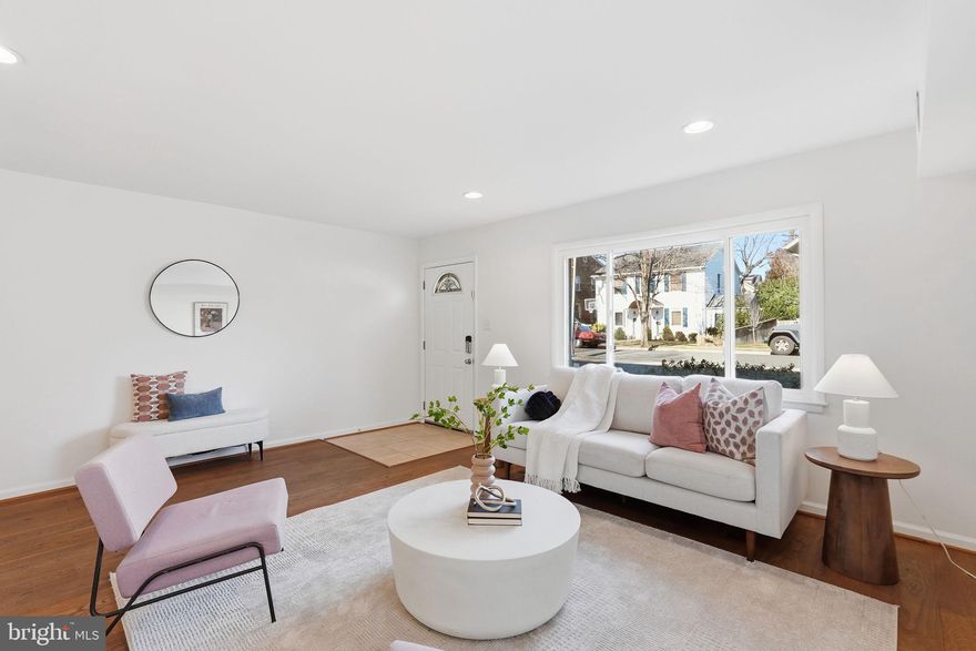 Just one block from The Avenue in the heart of Del Ray, this inviting, move-in ready townhouse duplex delivers the best of location and livability. Bright and turnkey, the home features freshly painted interiors, hardwood floors throughout, coveted off-street parking, and a fully fenced backyard with flagstone patio—perfect for entertaining or unwinding outdoors. Rare for historic Del Ray homes, you’ll love the amenity-rich layout with an en-suite primary bath and numerous walk-in closets.

The main level offers a wide, welcoming living room, convenient half bath, spacious open kitchen with stainless steel appliances and pantry, and a dedicated dining area with space for a full table, while three bedrooms and two full baths provide comfortable everyday living upstairs on the 2nd level. A floored attic adds valuable extra storage.

Recent updates include new oak hardwood flooring on the upper level (2024), oak floors on the main level (2019), fresh paint throughout (2026), a roof with 50-year Landmark shingles (2016), new washer and dryer (2022), Elfa closet systems, Nest thermostat, a renovated primary bath (2021), French drain and backflow system in the backyard (2021), and HVAC (2014).

Enjoy the rare combination of modern amenities without sacrificing walkability—steps to shops, restaurants, and the Del Ray farmers market, with easy access to bus routes and two Metro stations: Potomac Yard and Braddock Road. This is Del Ray living at its best. Schedule your showing today!