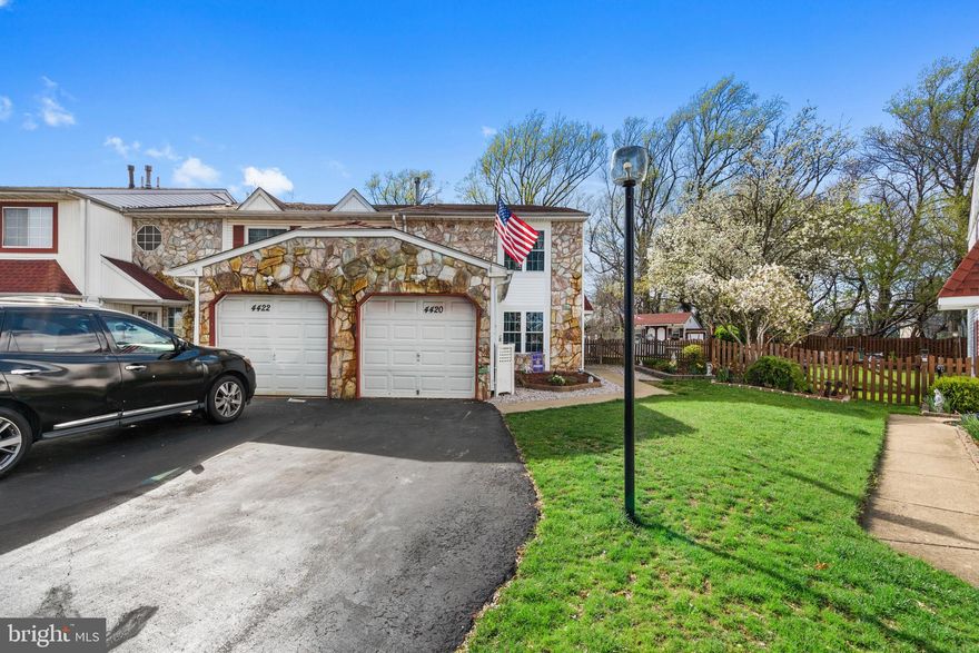 Welcome to 4420 Ernie Davis Circle—the largest townhome model in the desirable Liberty Circle community, located in Philadelphia’s sought-after 19154 zip code. Lovingly maintained by the original owners, this exceptional end-unit home offers nearly 2,000 square feet of beautifully updated living space, thoughtfully designed for first-time buyers, young families, or anyone seeking extra room and modern comfort.

From the moment you step inside, you’ll notice the spacious, open layout accented by neutral colors, stylish flooring, and abundant natural light. The main living area flows effortlessly into an updated kitchen boasting stainless steel appliances, granite countertops, attractive cabinetry, and a convenient breakfast bar, perfect for entertaining or everyday meals.

Adjacent to the kitchen, you'll find a generous dining area and a welcoming family room highlighted by a charming gas fireplace—ideal for cozy nights in. Sliding glass doors invite you out to a private backyard retreat, beautifully landscaped with a large deck, garden shed, spacious patio area, and firepit, perfect for entertaining family and friends. Enjoy unmatched privacy and tranquility as your yard backs directly to a peaceful wooded area owned by Fairmount Park.

The home's thoughtful renovations include converting part of the garage to add valuable interior square footage, creating a functional home office perfect for remote work or additional flexible living space. The modified garage still conveniently accommodates storage for a motorcycle, tools, and outdoor equipment.

Upstairs, your primary bedroom offers generous closet space and a private en-suite bathroom. Two additional spacious bedrooms and a well-appointed second full bath complete the second floor.

Enjoy worry-free living with recent major updates: a roof replacement in 2012, HVAC newly installed in 2019, and all windows and doors replaced within the last 10 years.

Conveniently located in the highly desired 19154 area, you'll have easy access to fantastic shopping, dining, entertainment, and major transportation routes, enhancing your everyday lifestyle.

Don't miss your opportunity to own this meticulously cared-for, spacious, and inviting home in Liberty Circle!  Schedule your tour today!