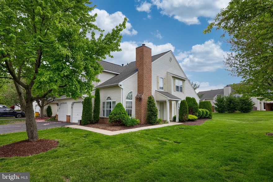 Rare, Spring Ridge End w/ 1st Floor Master       
If you’re one of the many people eager to call the highly desired Hickory Hill of Spring Ridge home, then this is your chance! This beautiful property is one of only a handful of end units with a sprawling, flat yard and private side entry. 
As soon as you step inside, you’re greeted by a two-story, tile foyer that flows openly to the main living spaces. To your left, you’ll find the bright and open living room with soaring vaulted ceiling with a fan, a gas fireplace framed by tall windows, and light carpeting. 
Next door, the spacious dining room has elegant touches with a large front window and matching carpet. 
In the kitchen, the family chef enjoys a tall, vaulted ceiling, Quartz countertops, tile backsplash, a new sink, and built-in stainless-steel appliances, while an eat-in breakfast room with a slider to the back patio is a great space to enjoy morning coffee or family breakfasts. 
The first floor Master bedroom features a vaulted ceiling with a fan, large double windows, two closets, and a private tile bathroom with a built-in vanity and step-in shower with a bench. 
Upstairs, you have a bird’s-eye view of the living spaces below. Two sizable, secondary bedrooms enjoy light carpeting while sharing a full hall bathroom with tub/shower, as well as a storage room. 
Your attached, one-car garage can be directly accessed by the main level laundry/mudroom, while a nearby powder room with built-in vanity offers even additional convenience. 
And finally, enjoy the quiet, peaceful surroundings of this lovely neighborhood while overlooking expansive green space from your back patio.