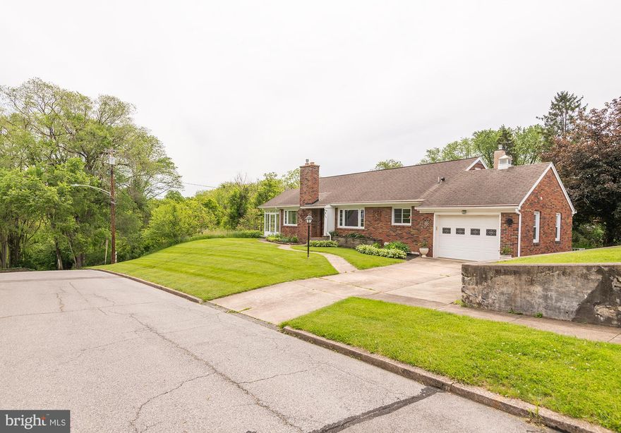 MOTIVATED SELLERS. Opportunity knocking for a LUCKY BUYER looking for a MOVE IN READY, recently updated, meticulously maintained 4 bedroom 2 bath brick ranch with 3 season sunroom, covered rear patio, grilling pavilion, shed, and walk-out finished basement. Located on a peaceful .67 acre lot, bird watchers will enjoy the relaxing views and chirping sounds nearby.  Upgraded heating and electrical, 2 gas fireplaces, cedar lined closets and much more. Always wished for a house with a "party" kitchen that guests will have room to hang out in while you cook and entertain?  Look no further. You'll appreciate  the custom Quality  Amish built wood kitchen cabinets, spacious  island, and desk area. BOTH kitchen AND baths offer  lots of WOW storage! The Potential for kitchenette in finished lower level makes multi generational living a possibility. See features sheet for all the quality exterior and interior improvements. Don’t miss this great investment possibility on one of the most desirable streets in downtown Historic Bellefonte close to all the cute shops and restaurants. Please note-Property being sold "as is," Room dimension and square footage approximate. Buyers to verify.