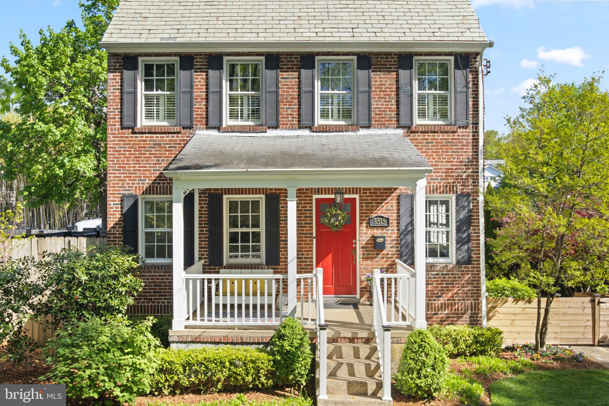Home Sweet Home in Martin’s Additions! This charming home is located in the heart of the neighborhood, surrounded by lovely homes, tree-lined streets and a warm friendly community. Just a stone’s throw to groceries, pharmacy, cafe and farmer’s market, the location is as convenient as it is charming.
A+ curb appeal features a perfectly manicured lawn, lovely brick facade, slate roof and a covered front porch, the ideal place to spend a summer evening enjoying a cool drink.
It’s apparent there has been a lot of thought put into maximizing useable space at this property. Three sheds tucked neatly away at the side of the home provide plenty of storage for tools and toys. A detached studio is used as a private home office, but would also be a great man cave or chic she shed! Outdoor entertaining is a snap on the large slate patio with outdoor lighting.
The interior is bright and sunny and features a clean, neutral decor with hardwood floors. The kitchen has been reconfigured to allow space for a center island and a large table. An addition on the back of the home includes a sunny family room and highly functional mud room with window seat and storage … The perfect place for your shoes, backpacks, umbrellas and more! Three bedrooms and one full bath up, plus a full-size attic providing additional storage. The finished basement with full bathroom provides a recreation/exercise room and includes a separate laundry room with sink and folding area.