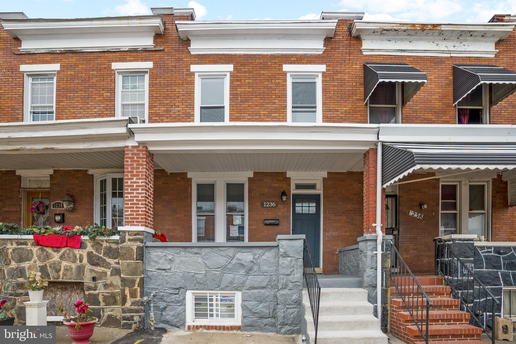 Completely renovated 3 bedrooms 1.5 bath rowhome In close proximity to Bocek Park & Collington Square Park. This rowhouse offers a nicely finished front porch and open floor plan with recessed lights throughout the main level. Stainless steel appliances, granite countertops and kitchen window that overlooks your fenced backyard. Upper level offers a skylight that brings in lots of natural light, 3 spacious bedrooms and a full bathroom with double vanity and accent tile around the bathtub. Walkout Lower level partially finished, great space for a family room, lots of extra storage space and laundry area.