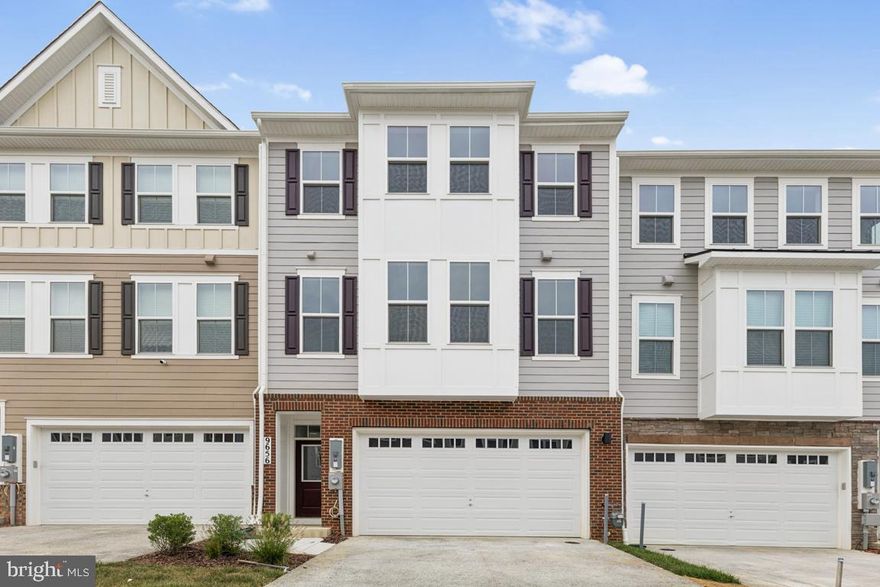 Gorgeous view from all four levels of this beautiful townhome.  Immediate delivery.  This house is larger than many single family houses.  Upgrades galore!  Gourmet kitchen.  Huge center island.  Secondary bedrooms can accommodate queen size bedroom sets. (PHOTOS OF ACTUAL HOME)