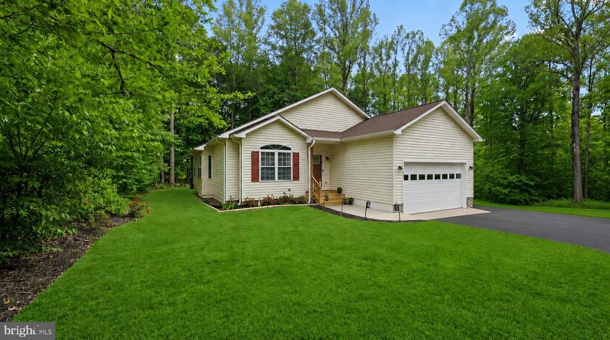 Beautiful newer one-level home featuring 3 bedrooms and 3 full bathrooms, thoughtfully designed for comfort, privacy, and easy everyday living. Two spacious bedrooms feature en suite bathrooms, while the third bedroom is conveniently located near a full hall bath — ideal for guests or flexible living arrangements. This light-filled open floor plan offers a seamless flow between the living, dining, and kitchen spaces, highlighted by soaring vaulted ceilings in the family room and large windows that bring in abundant natural light. Luxury LVP flooring runs throughout most of the home, adding both style and durability. The stunning gourmet kitchen is truly the heart of the home, showcasing gorgeous quartz countertops, tall cabinetry, soft-close cabinets and drawers, a built-in wine fridge, oversized pantry, and a large center island perfect for gathering, entertaining, or casual dining. The kitchen opens beautifully into the dining and family rooms, creating an inviting space ideal for both everyday living and hosting guests. The lovely owner’s suite offers a peaceful retreat with a vaulted ceiling, spacious walk-in closet, and beautifully appointed owner’s bath designed with comfort in mind. Enjoy exceptional storage throughout the home with oversized closets and abundant cabinetry. Relax year-round on the screened-in porch overlooking the large private backyard — the perfect setting for morning coffee, evening gatherings, or quiet outdoor enjoyment. Additional highlights include a spacious 2-car garage and the convenience of true one-level living. Located in the amenity-filled Lake of the Woods community offering lakes, beaches, golf, horseback riding, pools, parks, walking trails, tennis courts, and so much more!