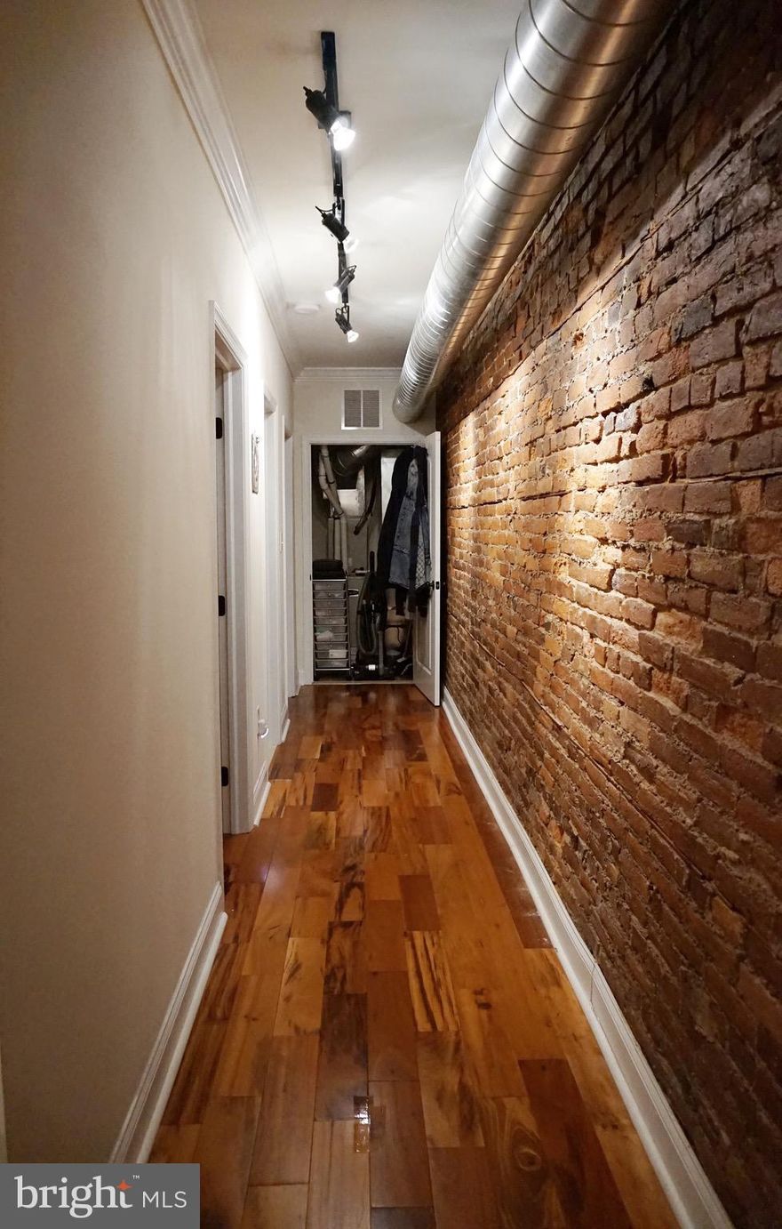 Upgraded multi family with separate utilities including air (except for water).  This historic building has super charm from the exposed brick and exposed ductwork to the back yard. There are 4 units and all have been updated and is located in a great location!