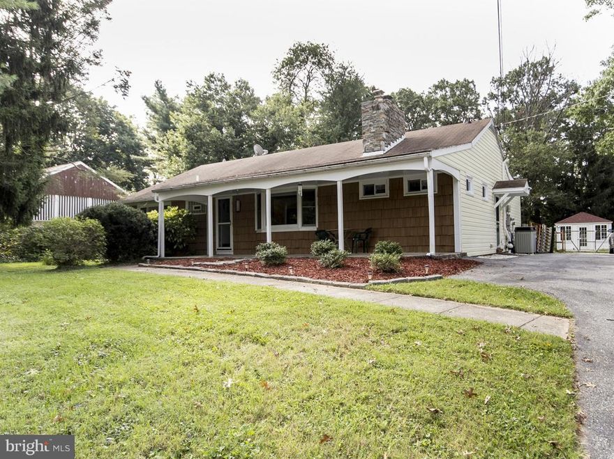 Bright & spacious rancher on lovely .46 ac lot. Expansive main level includes master suite with 2 walk in closets & luxury bath; sunroom (unhtd) large laundry room, LR, DR, Kit. Lower level has huge FR w/ bar, plus home office. Outside is a fantastic 2011 building 20' x 14' w/ cath clg, walls of windows, fully insulated, electric;  new brick patio; storage shed. A great retreat! Move in & enjoy!